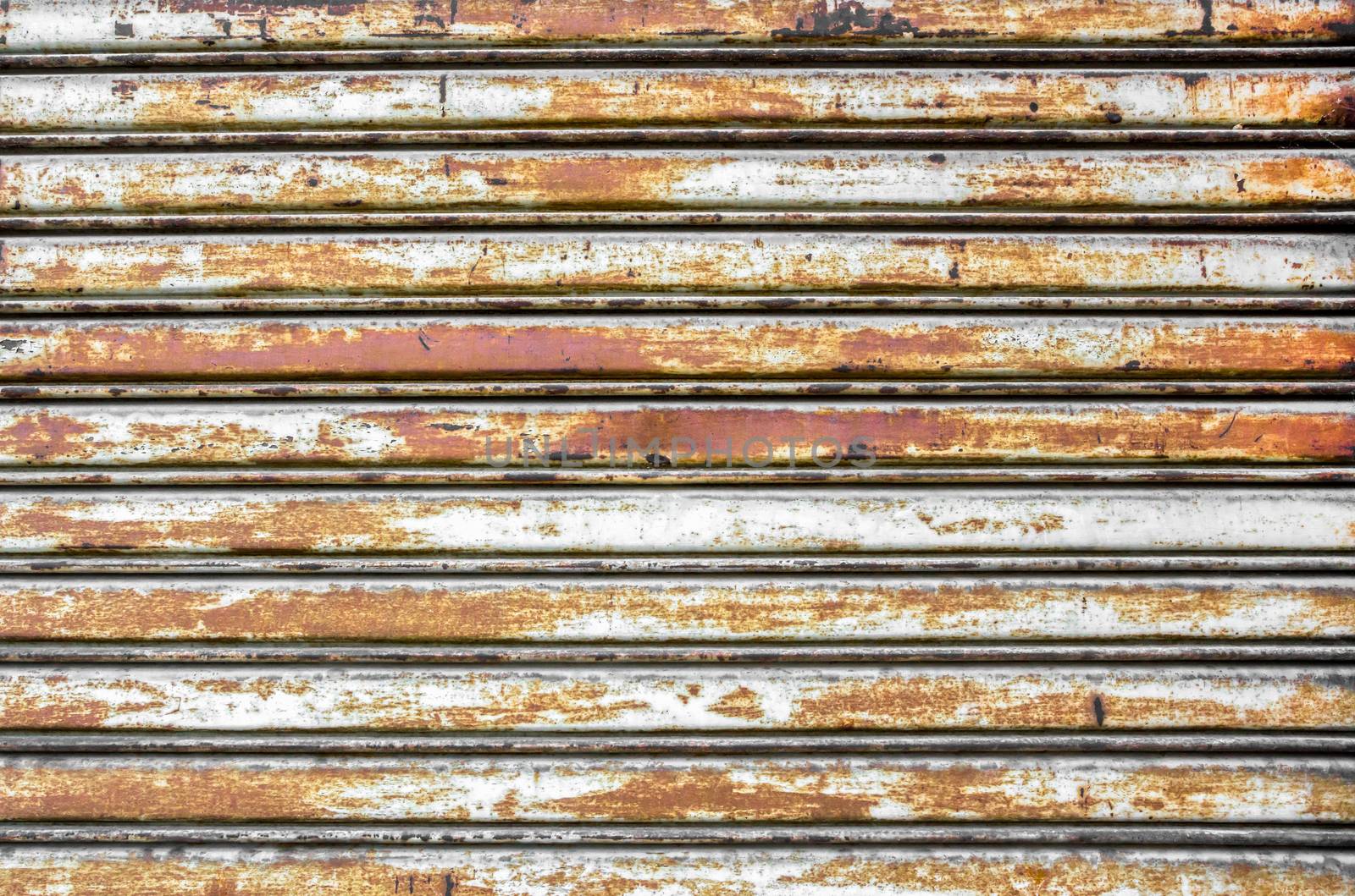 Rusty metal shutter by germanopoli