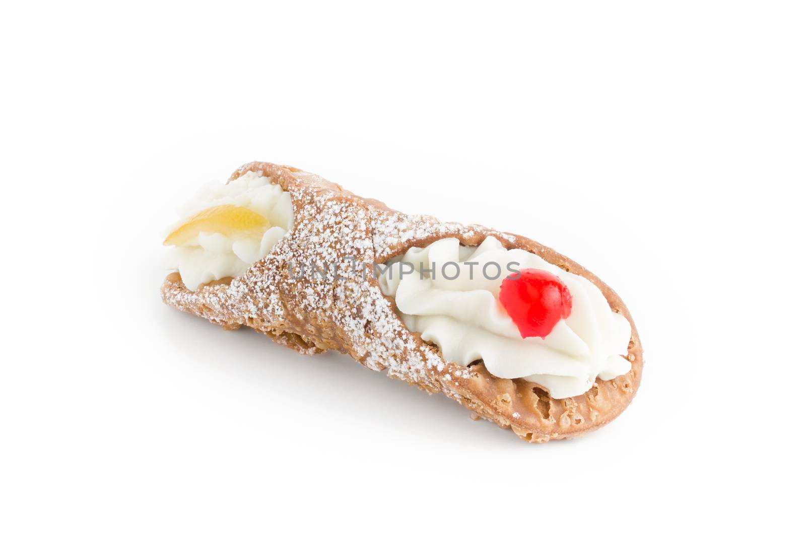 Typical sicilian dessert, cannoli, with candied fruit.