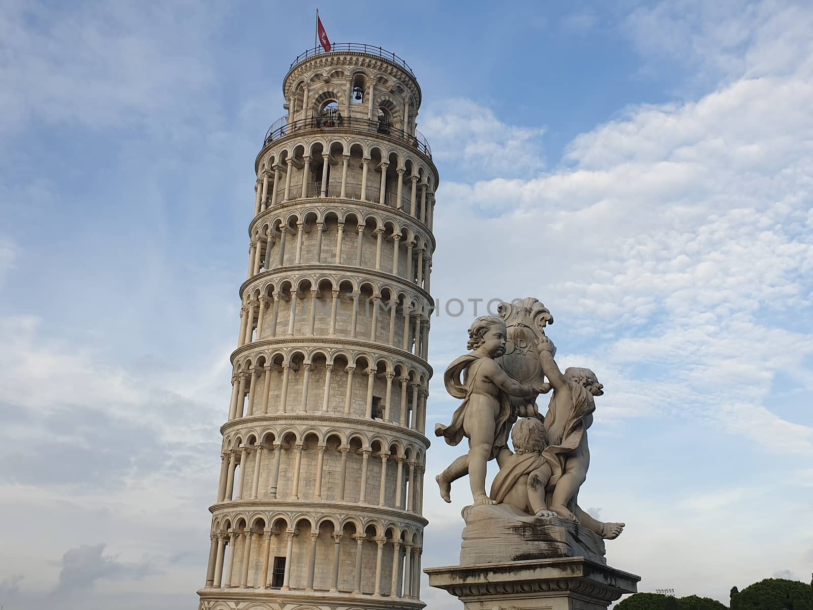 The leaning tower of Pisa and Piazza dei Miracoli in a sunny day - The Miracle Square, the Leaning Tower and the Cathedral is visited everyday by thousand of tourists - Pisa, Tuscany, Italy by matteobartolini