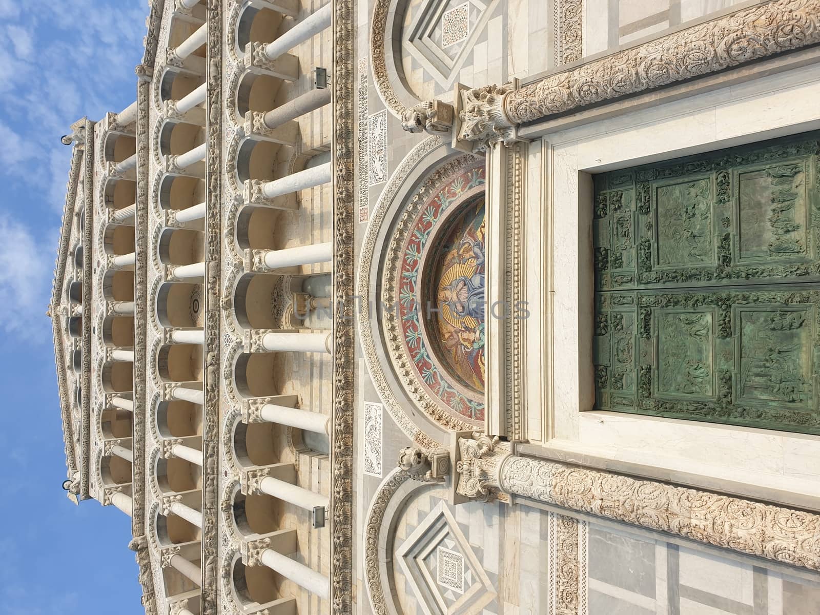 The leaning tower of Pisa and Piazza dei Miracoli in a sunny day - The Miracle Square, the Leaning Tower and the Cathedral is visited everyday by thousand of tourists - Pisa, Tuscany, Italy