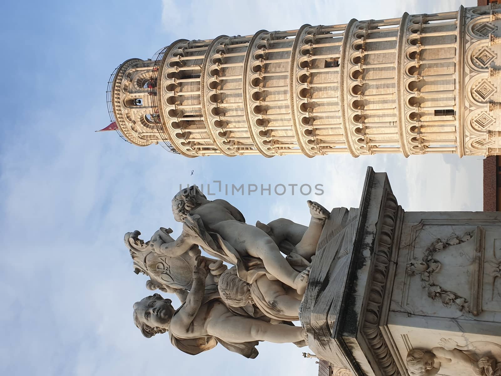 The leaning tower of Pisa and Piazza dei Miracoli in a sunny day - The Miracle Square, the Leaning Tower and the Cathedral is visited everyday by thousand of tourists - Pisa, Tuscany, Italy by matteobartolini