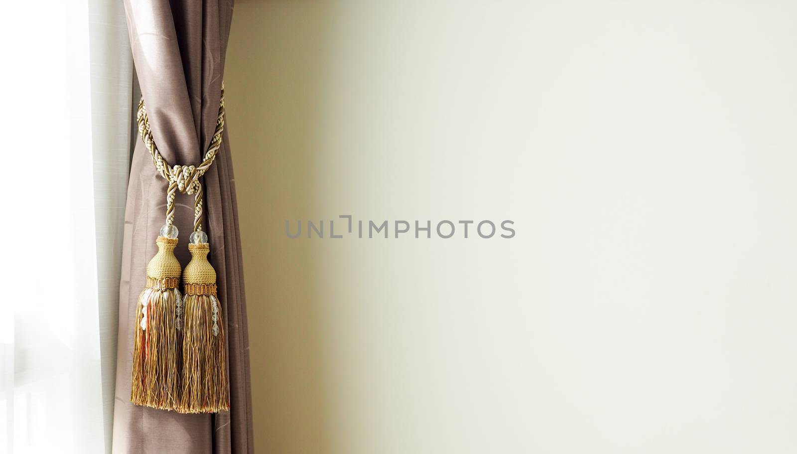 Elegant curtains close to the wall. Home decor. with copy space. by kittima05
