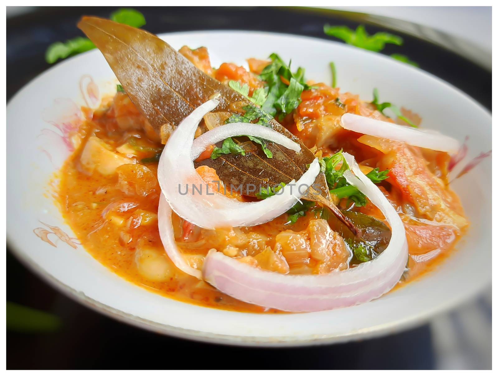 Colorful Delicious yummy indian spicy mushroom gravy in white bowl and it's one of favorite restaurant cuisine food