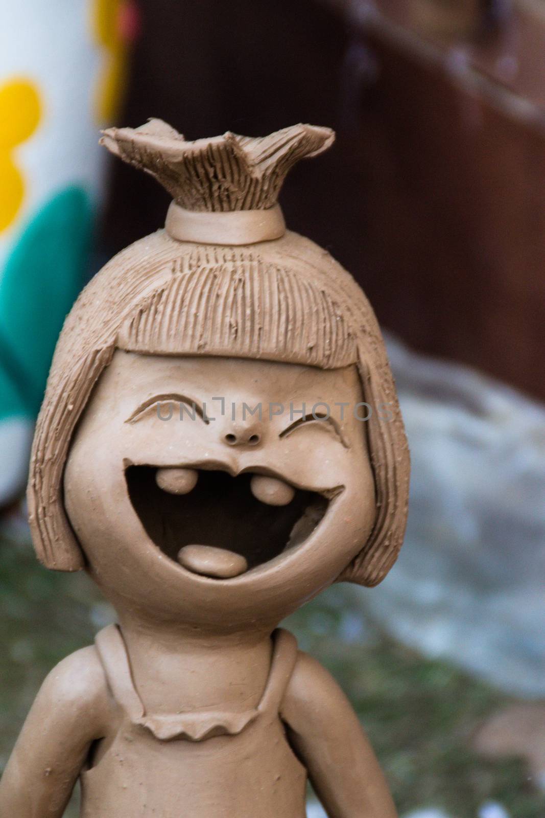Happy Ceramic dolls for garden decoration. Cute ceramic clay pot by kwhisky