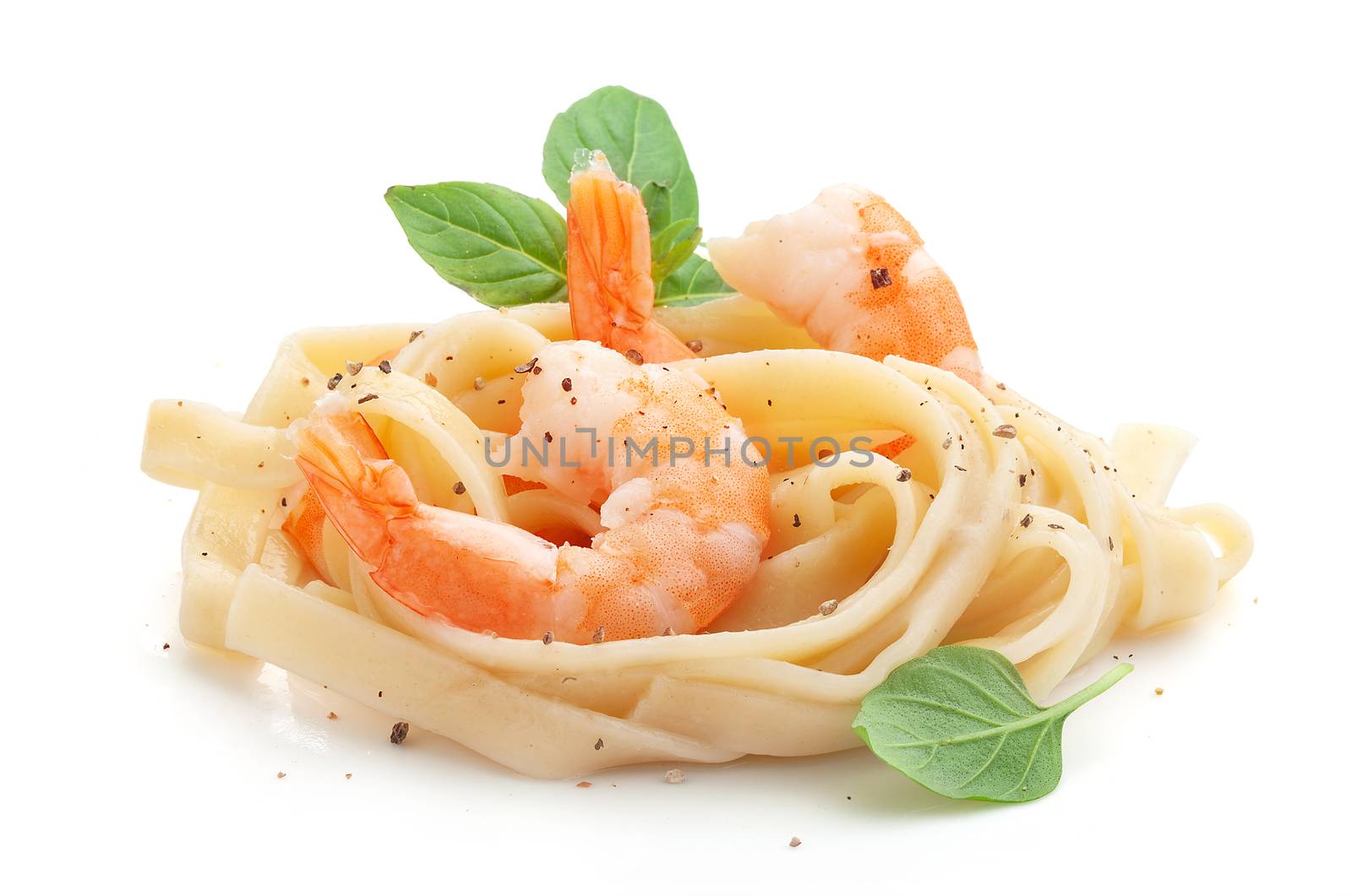 Boiled shrimps with pasta on the plate