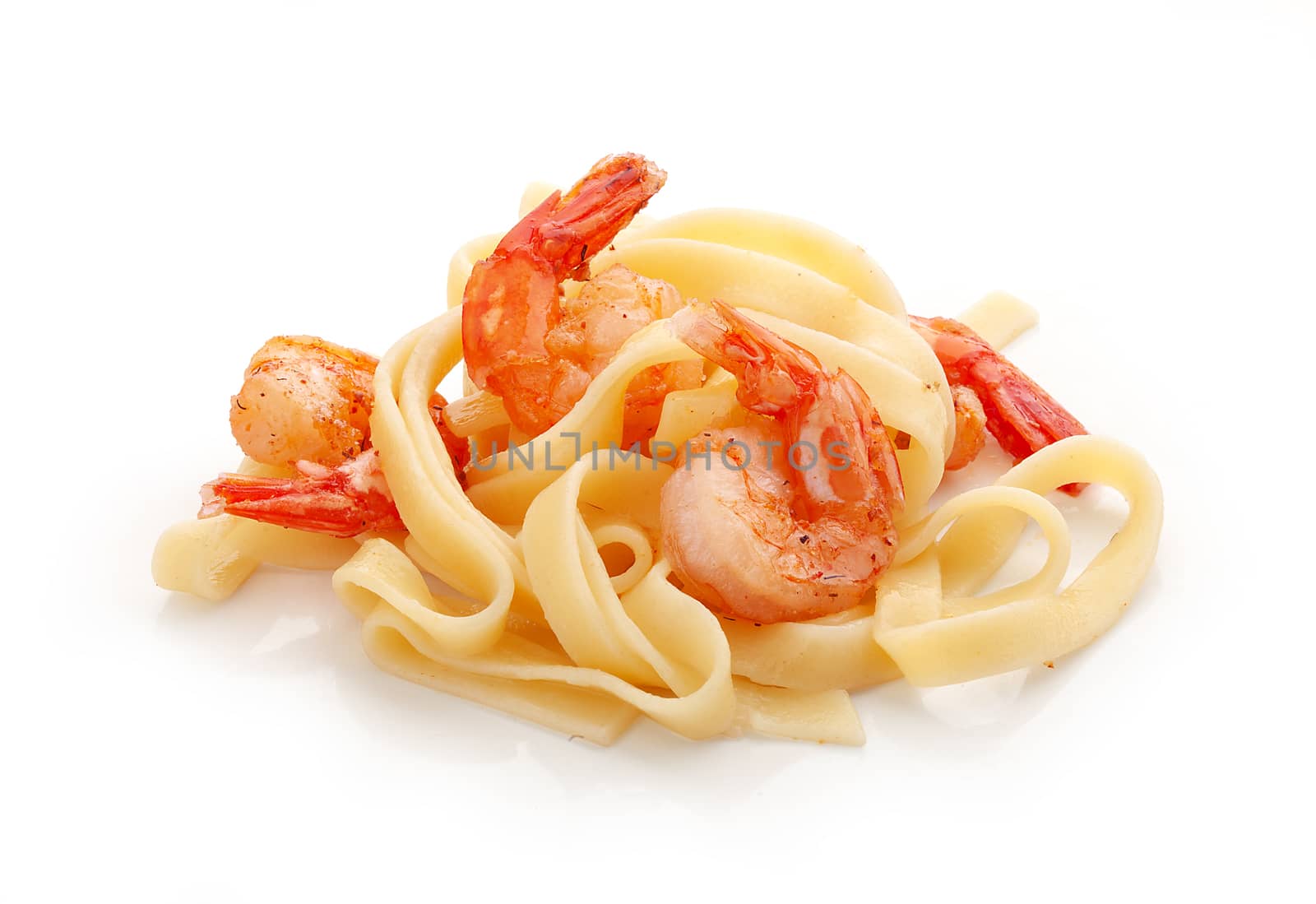 Isolated fried shrimps with fettuccini on the white plate
