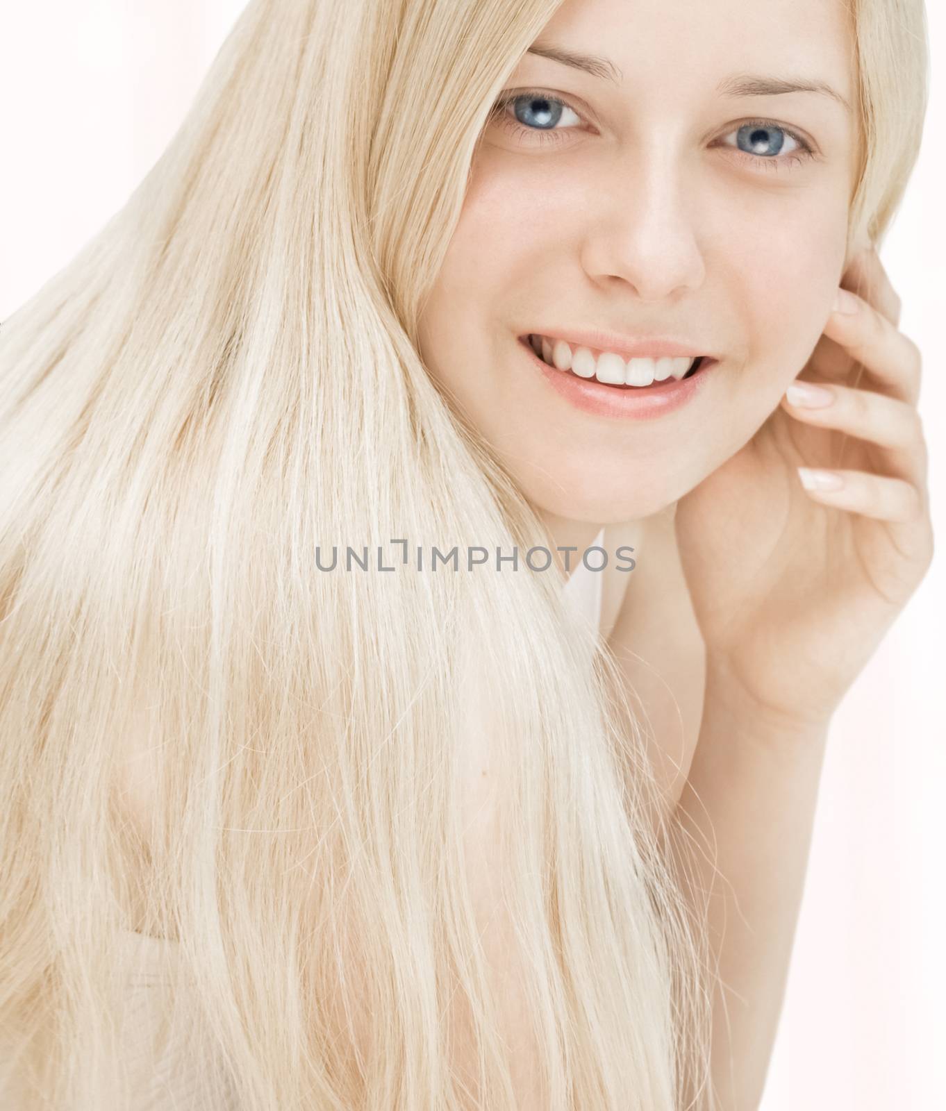 Beauty face close-up of young woman, blonde hair and chic make-up for skincare and haircare brand by Anneleven