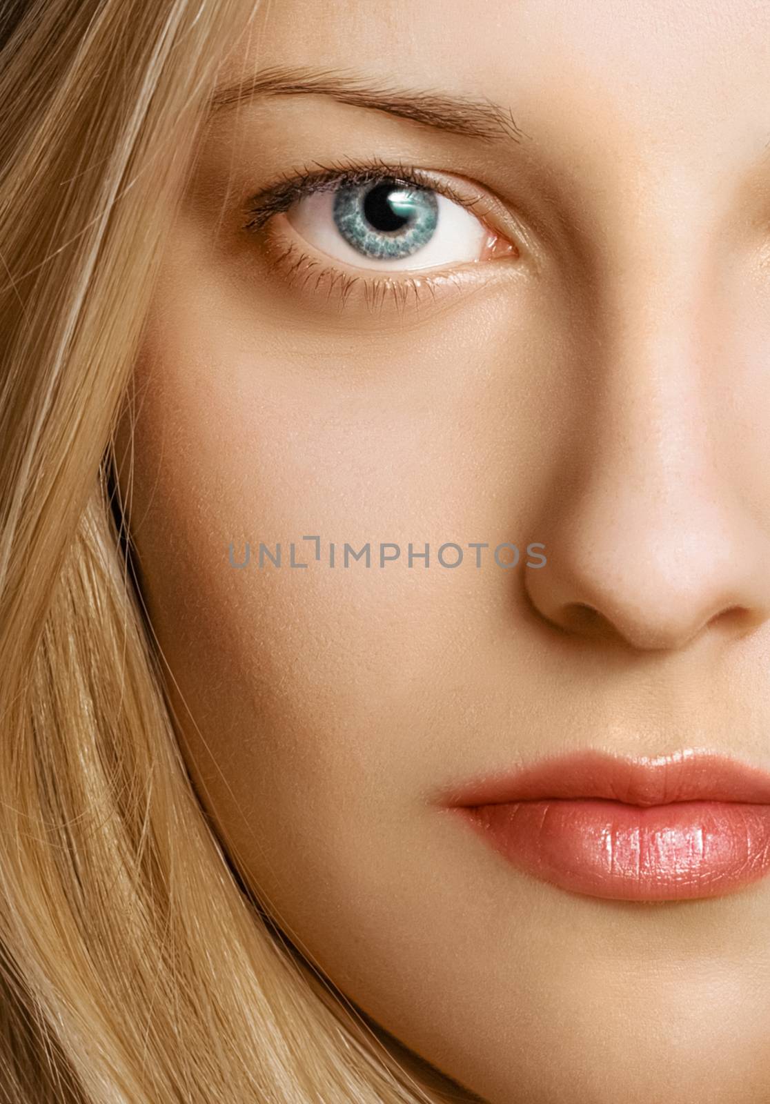 Beauty face close-up of young woman, blonde hair and chic make-up for skincare and haircare brand ads