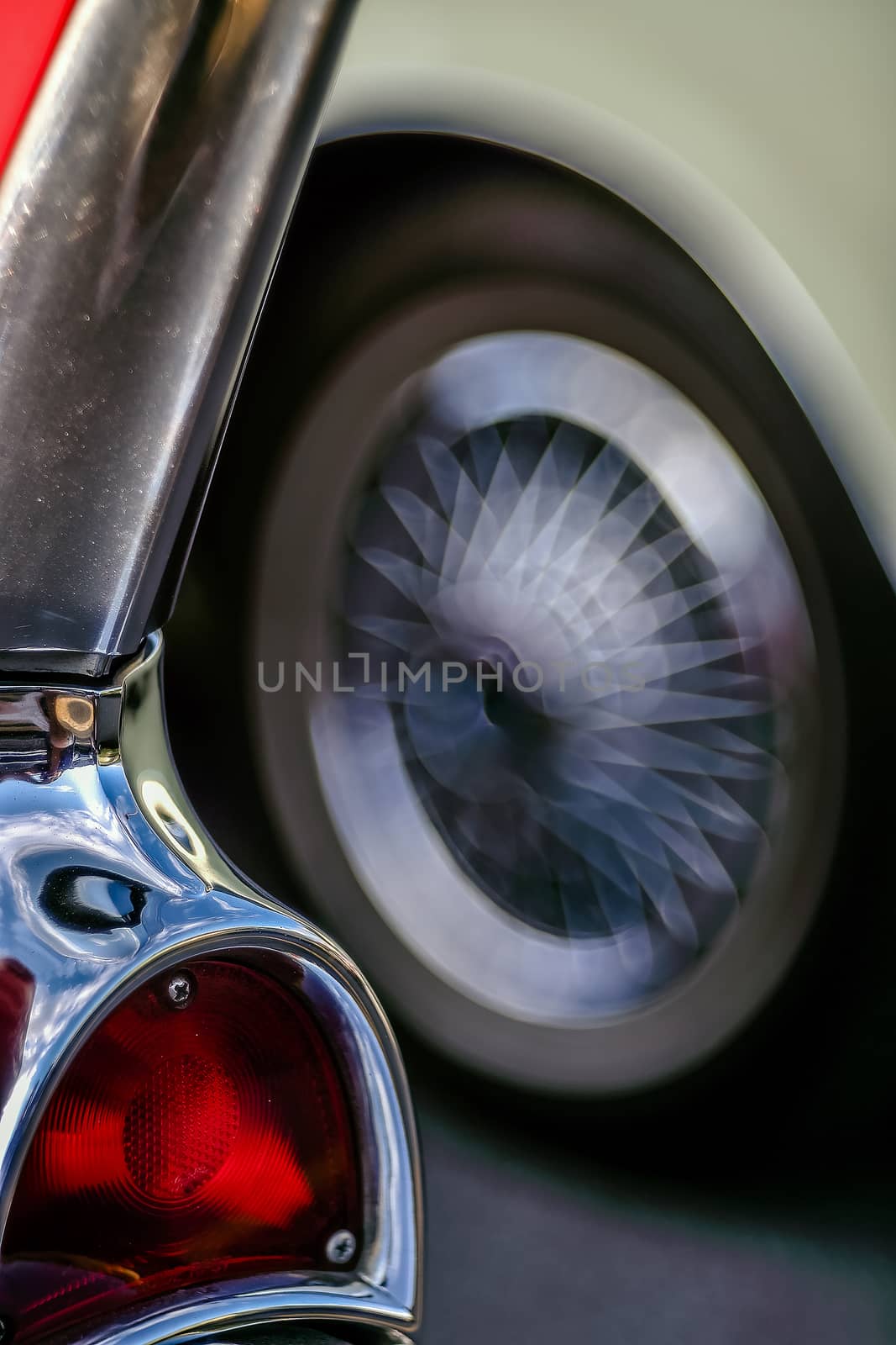 Retro rear headlight lamp vintage classic car. Soft focus, boke background with copy space. Close-up view part of a vintage old car with bubble bokeh effect.