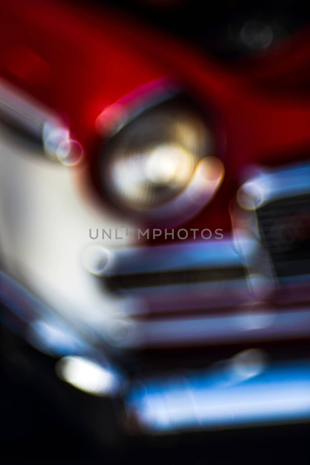 Colorful abstract background retro car. Boke background with copy space. Close-up view vintage American auto details with bubble bokeh effect.