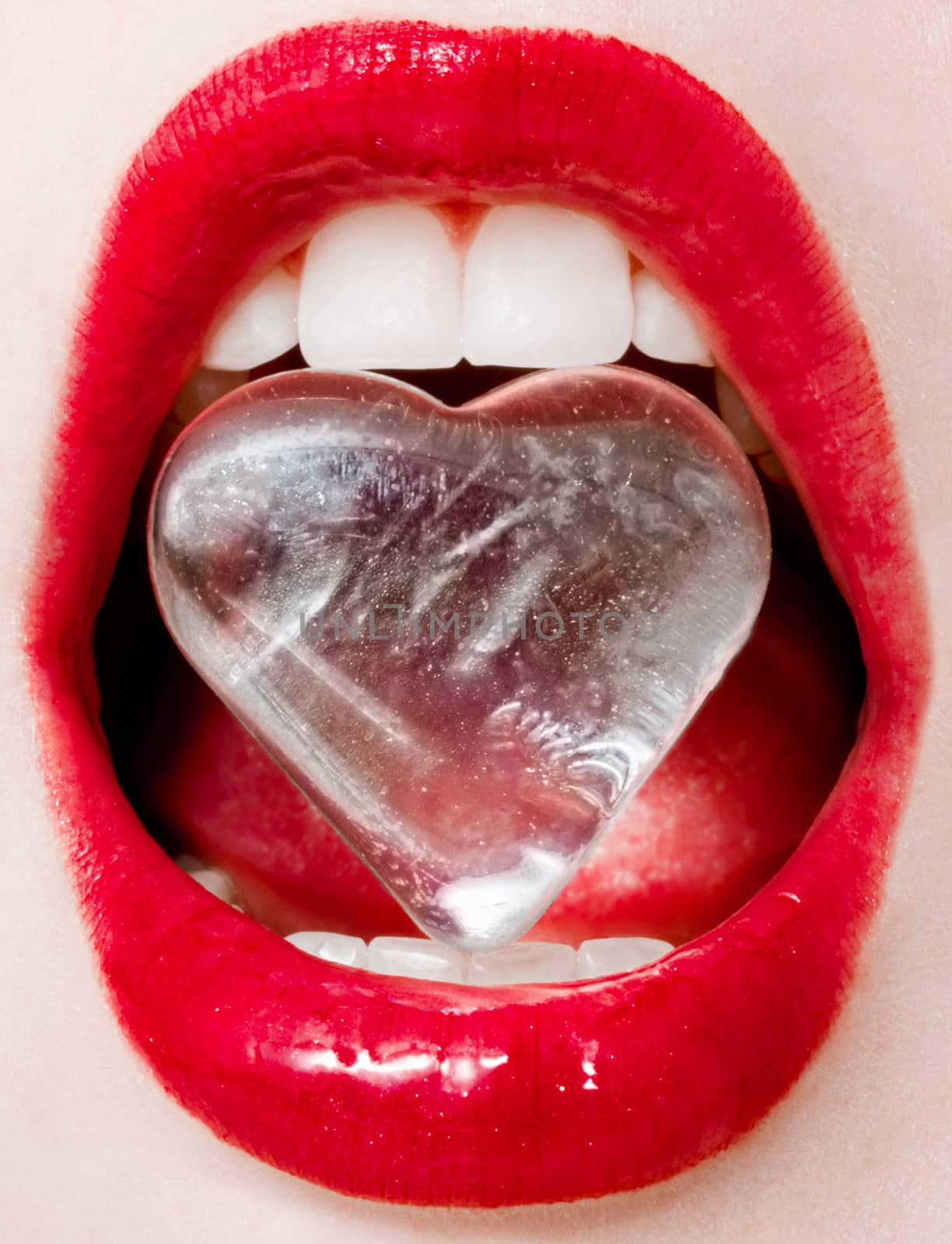 Icy heart, female lips with glossy lipstick and white teeth for glamour and beauty brand by Anneleven