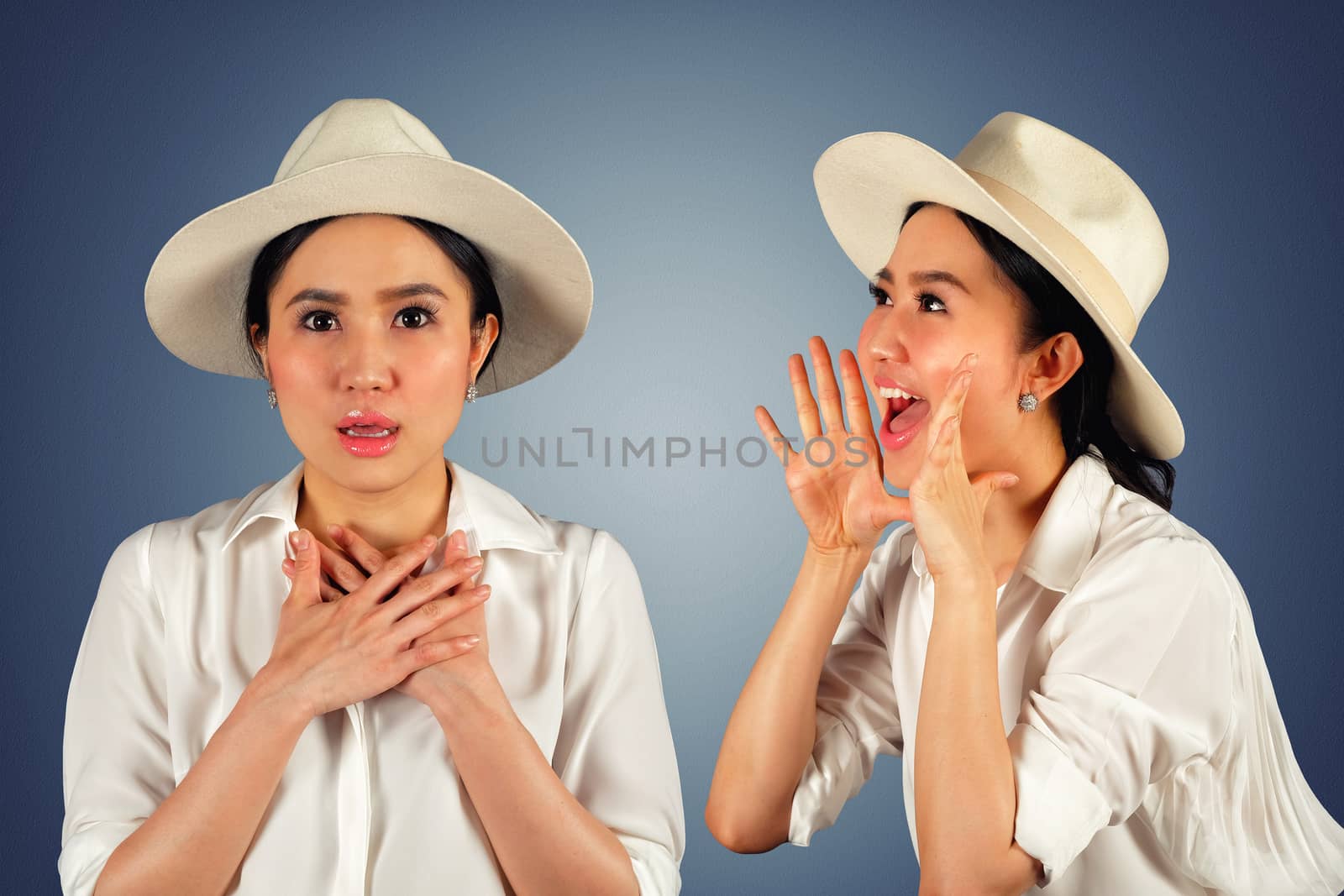 Beautiful young woman shouting on dark blue background  by Surasak