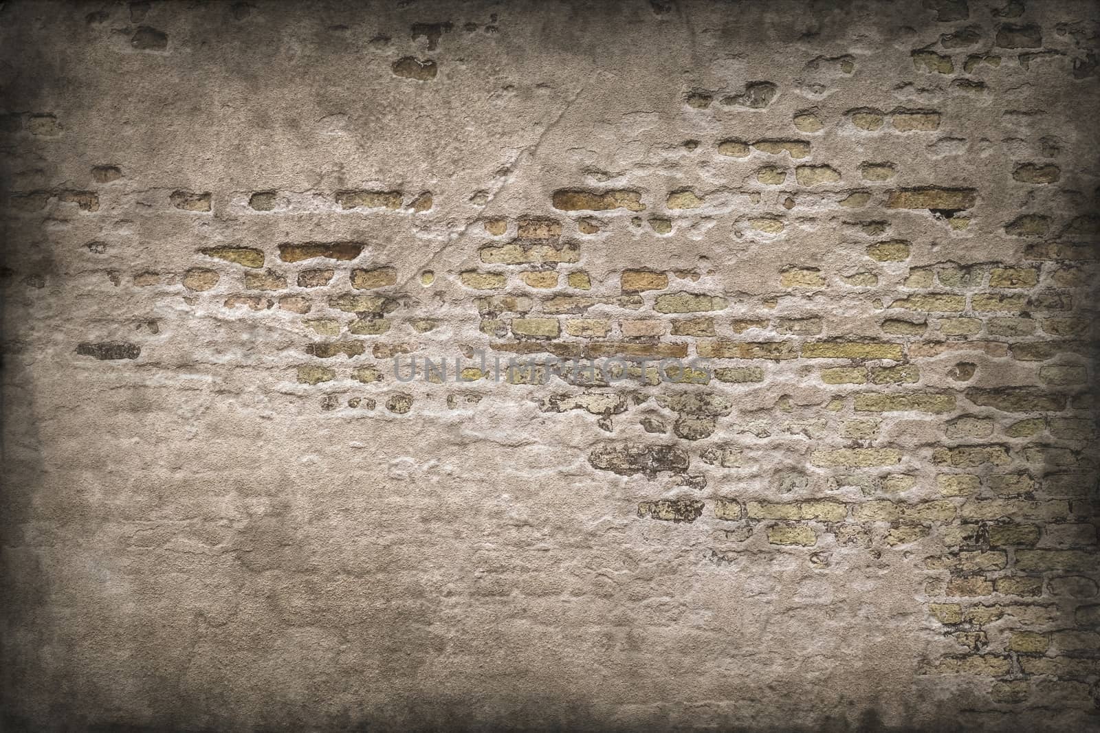 Aged and weathered old brick wall texture in a vintage retro design 