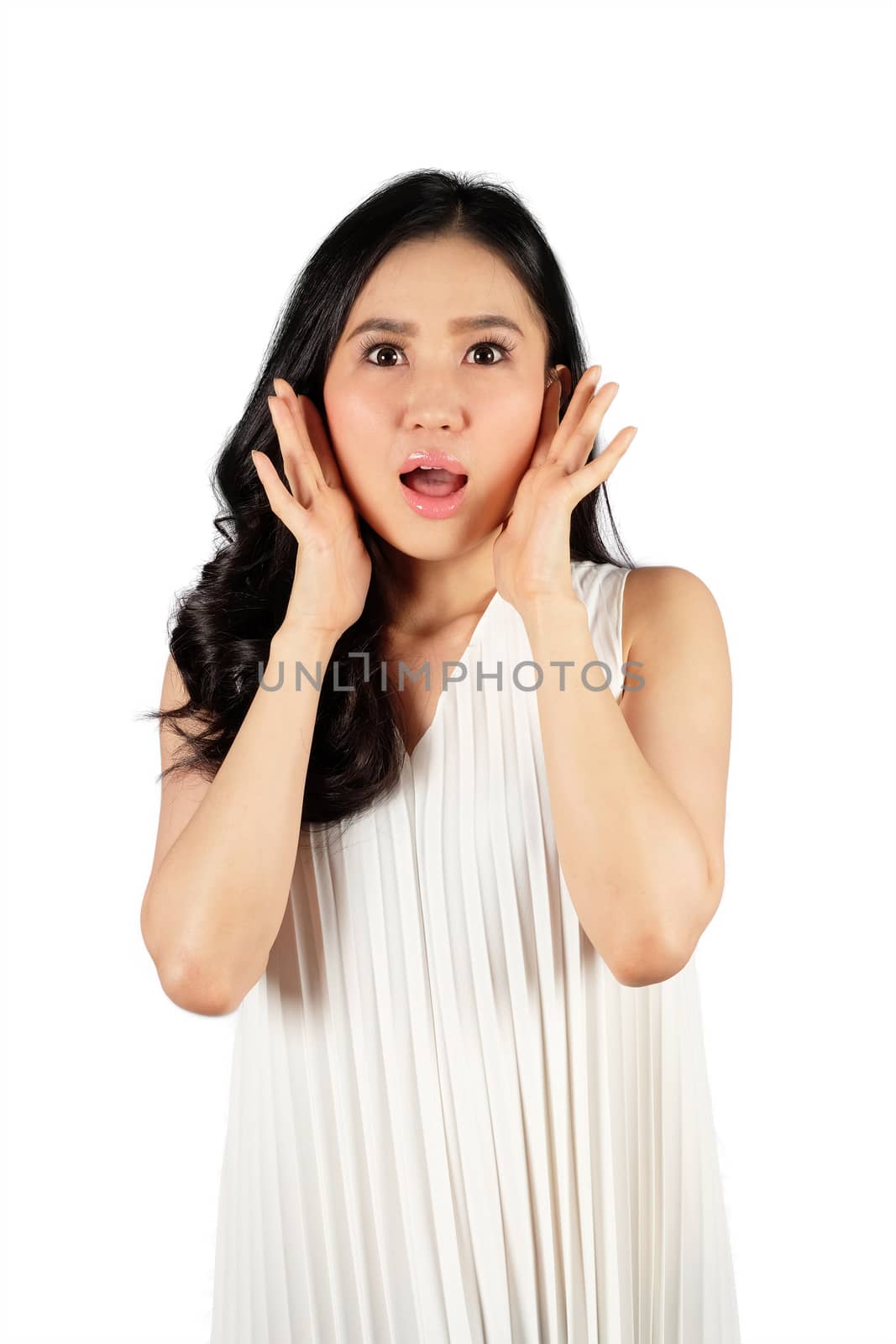 Shocked woman wearing stylish hat looking at camera and white ba by Surasak