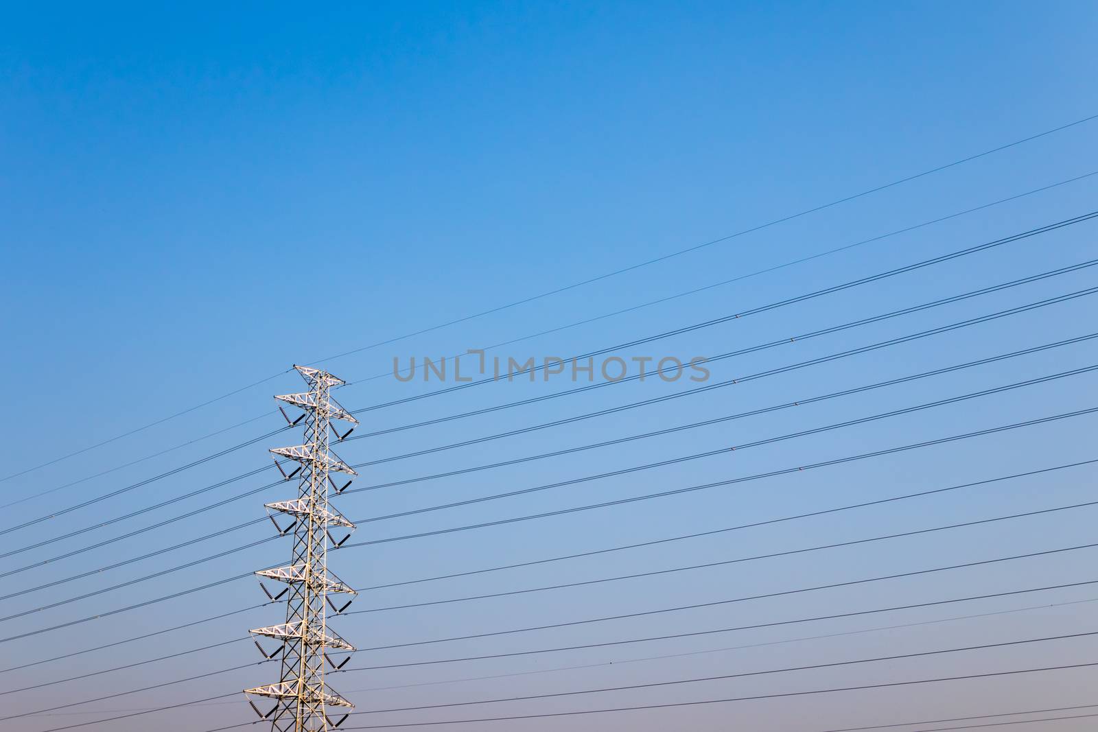 High voltage post,High voltage tower on clear blue sky background