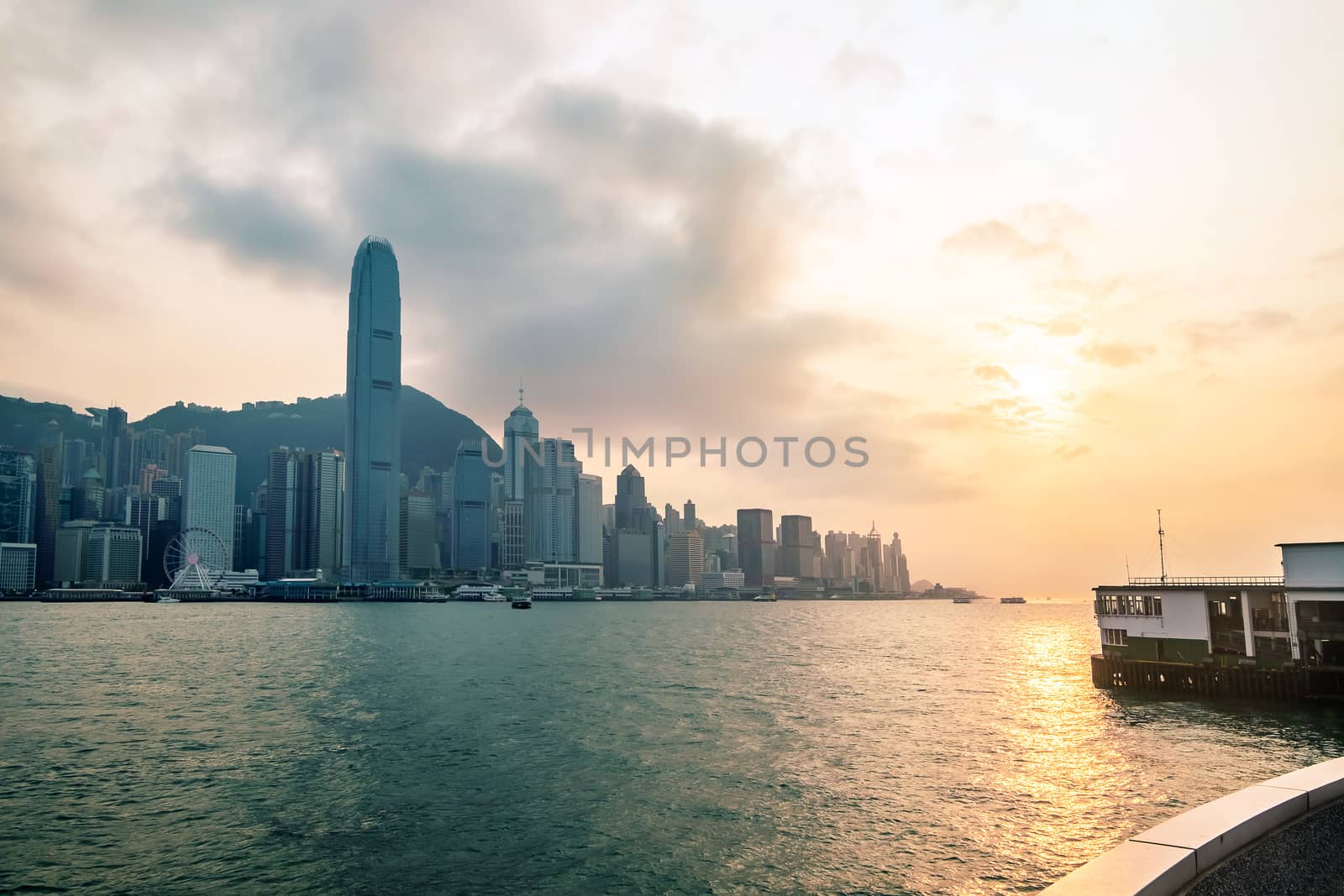 Hong Kong skyline before sunset seen from Kowloon, Hong Kong, China.