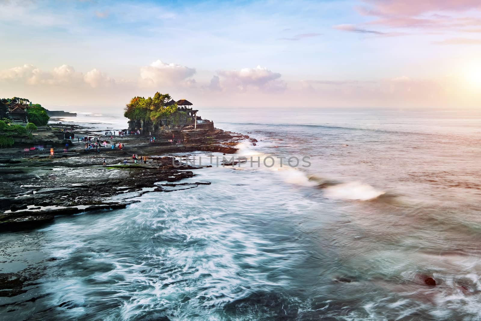 Tanah Lot & Batu Bolong temple. Long exposure effect, Bali Indonesia. Tropical nature landscape of Indonesia, Bali.