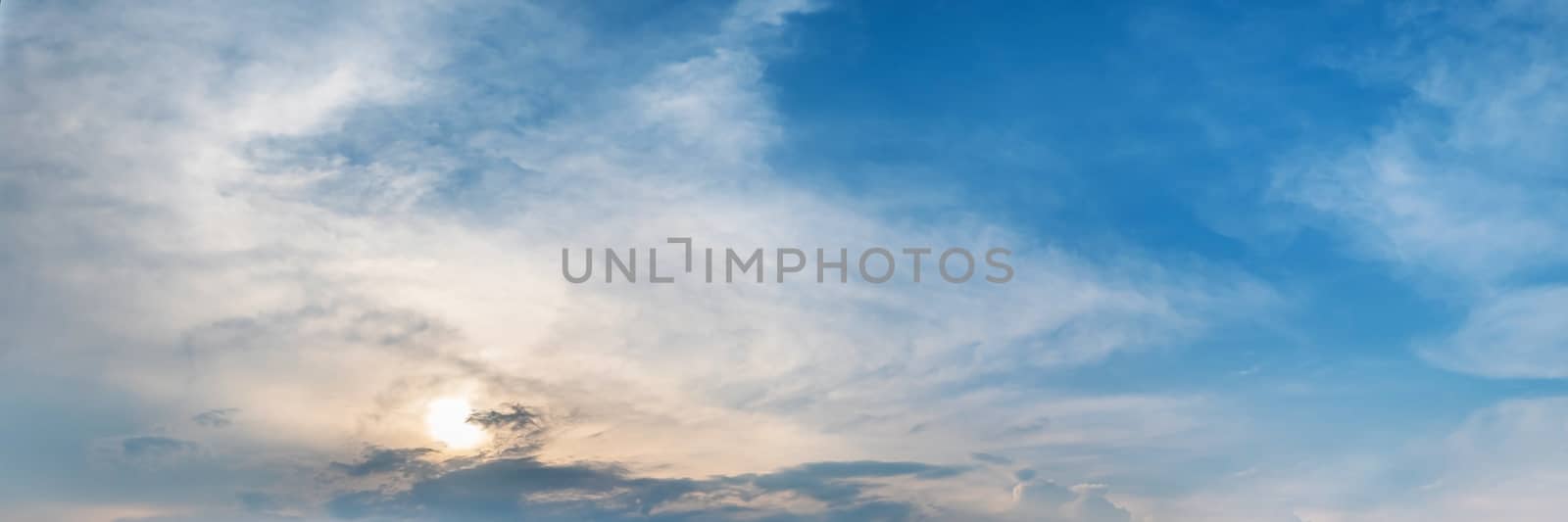 Panorama sky with cloud on a cloudy sunrise or sunset. Panoramic image.