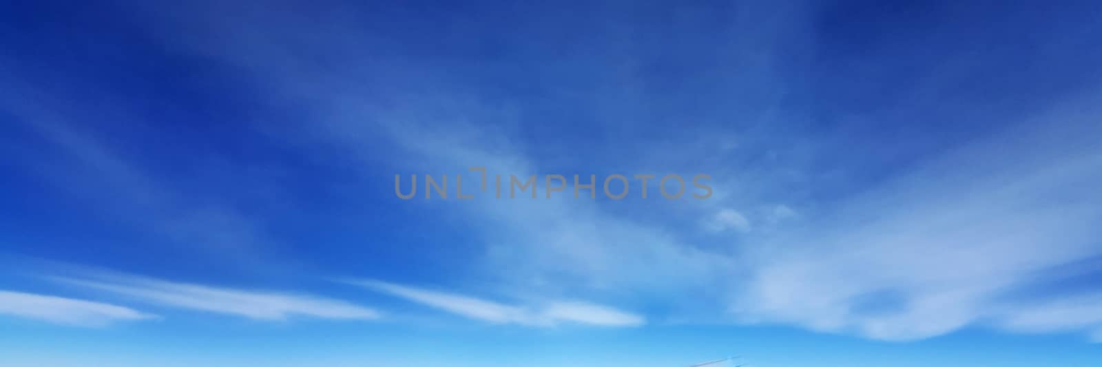 Panorama sky with cloud on a sunny day. Beautiful cirrus cloud.