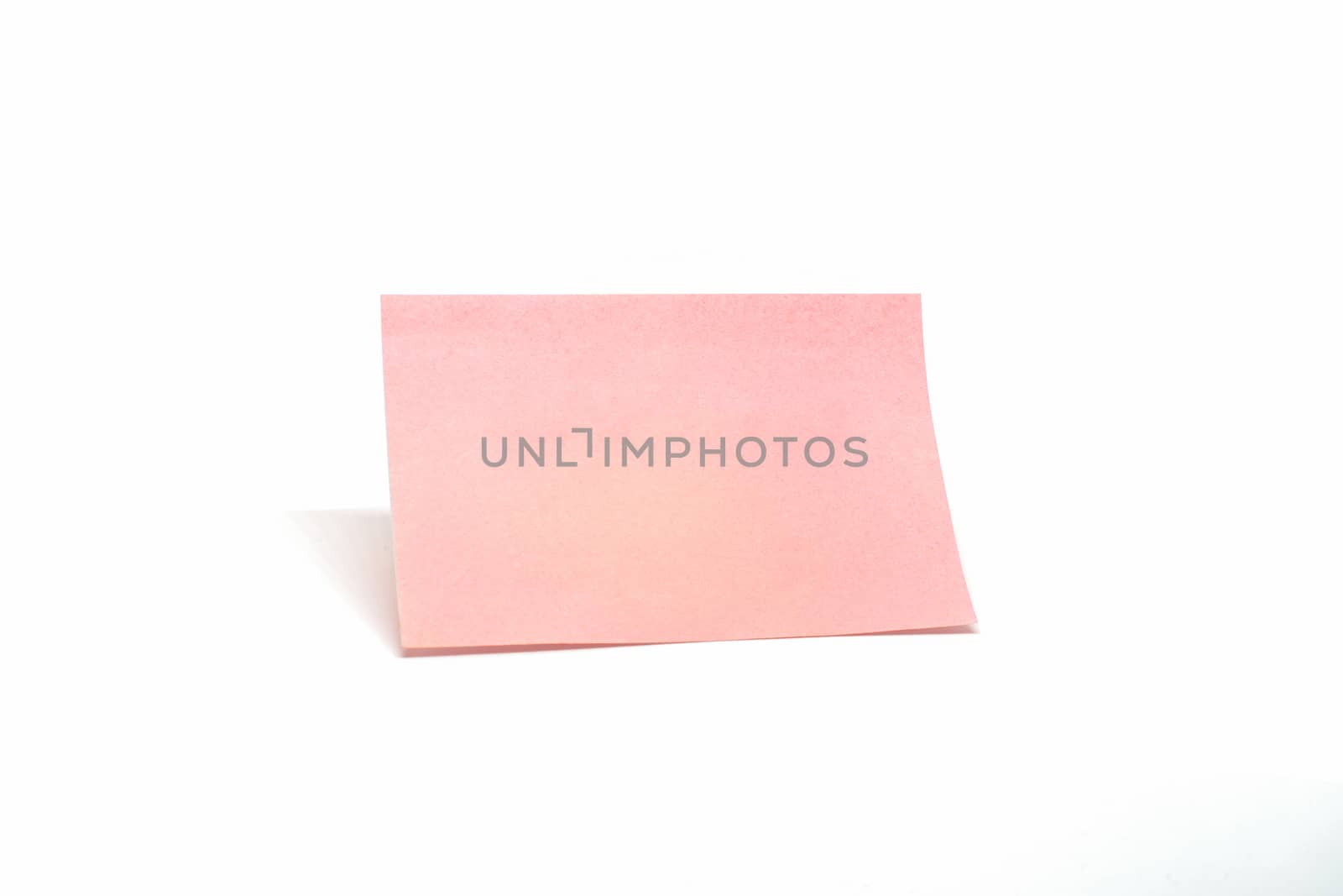 Isolated Single pink notepad paper on white background.