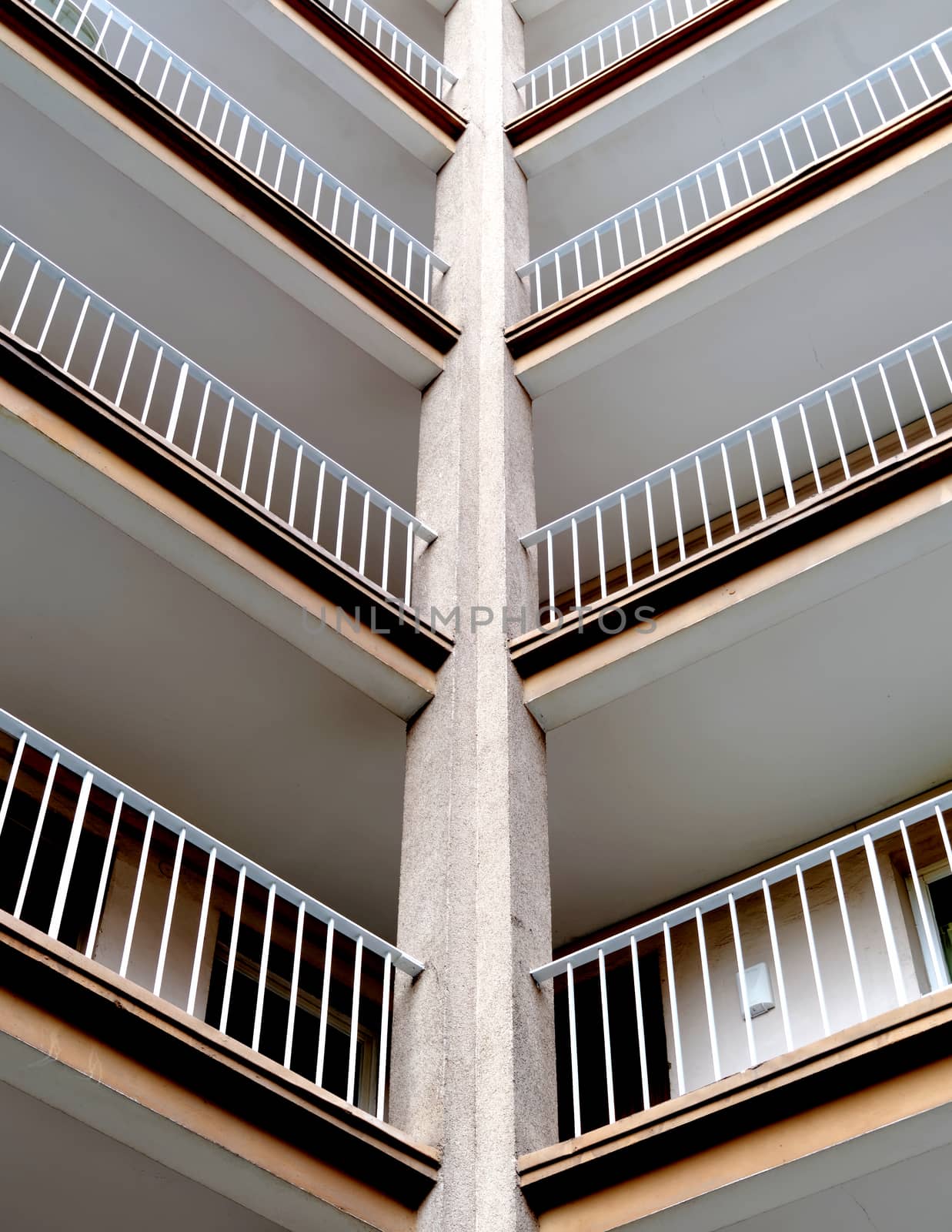 Abstract recording of the outside entrances of an old ugly high-rise building with lots of apartments for students and people with very little money, Germany