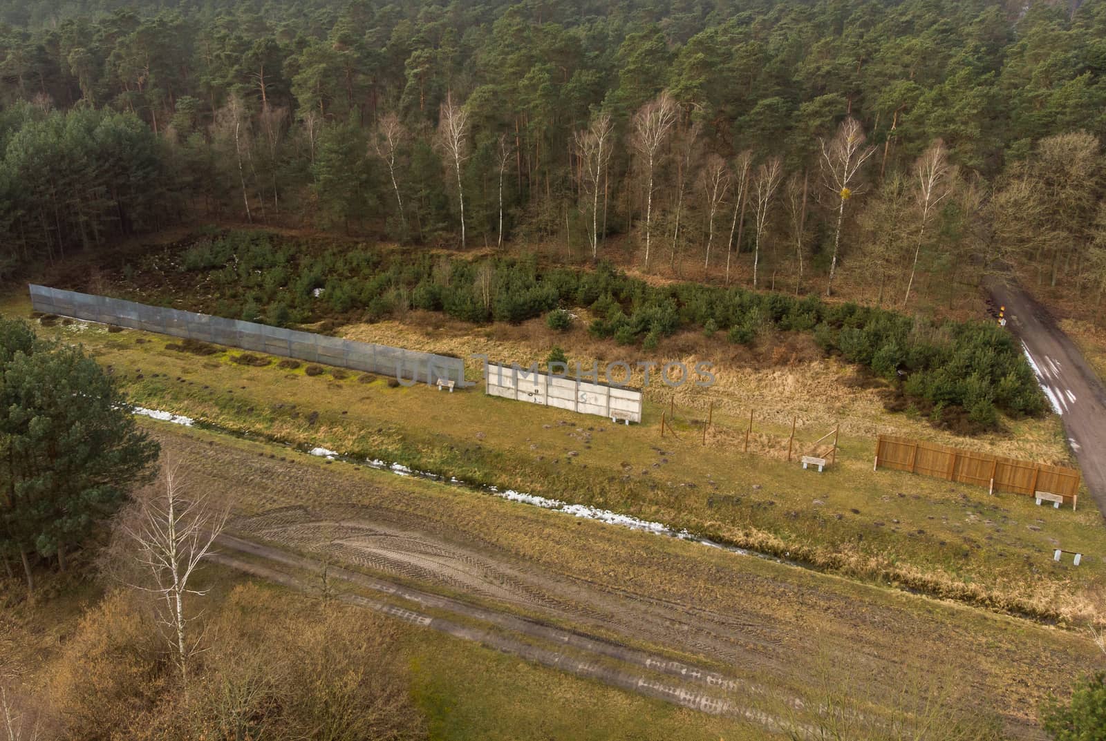 Aerial photograph of the former border fortifications between the GDR and the FRG. Open-air exhibition in a forest near Kaiserwinkel on the border of Lower Saxony and Saxony-Anhalt. Made with drone