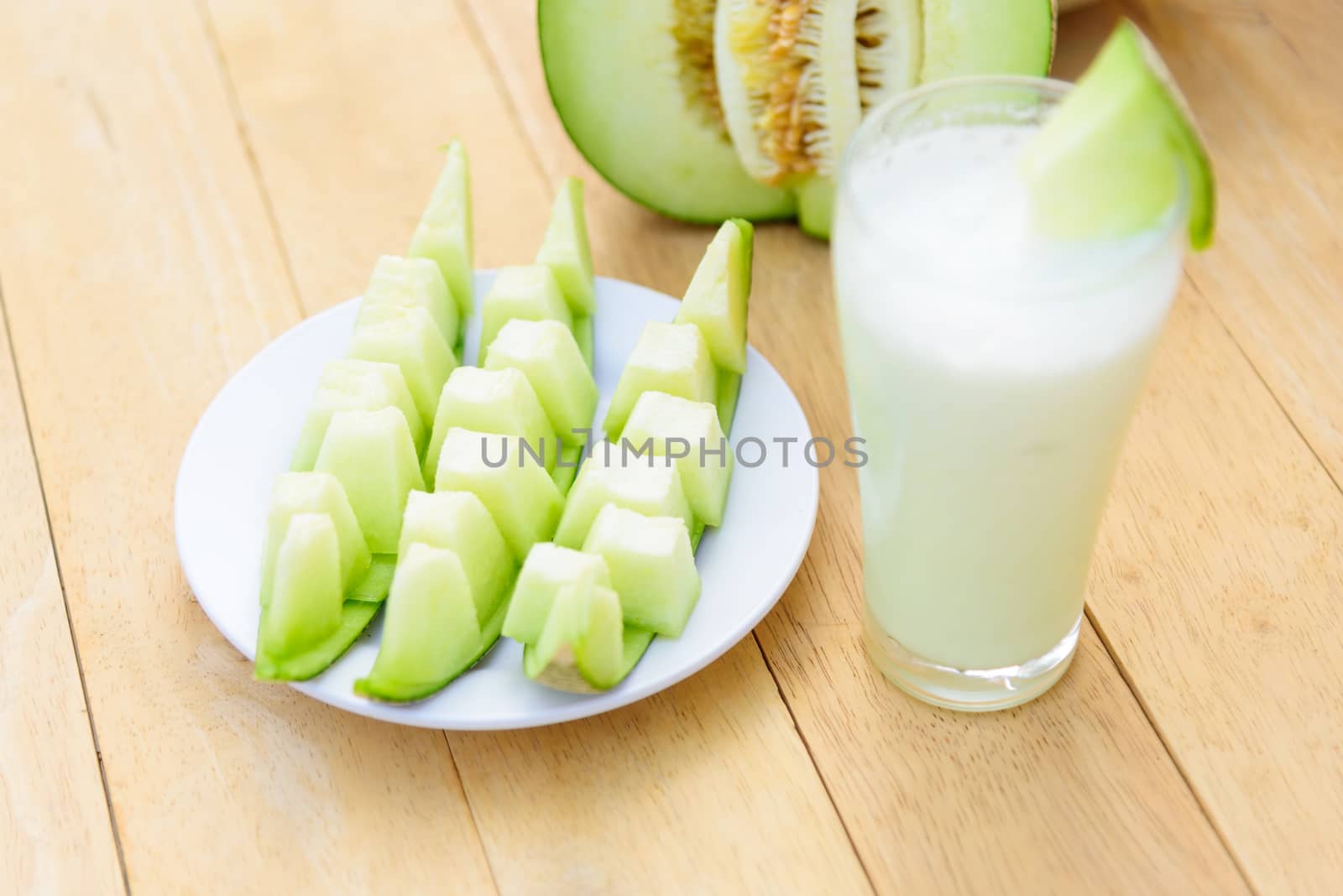 Fresh Green melon in dish by rukawajung