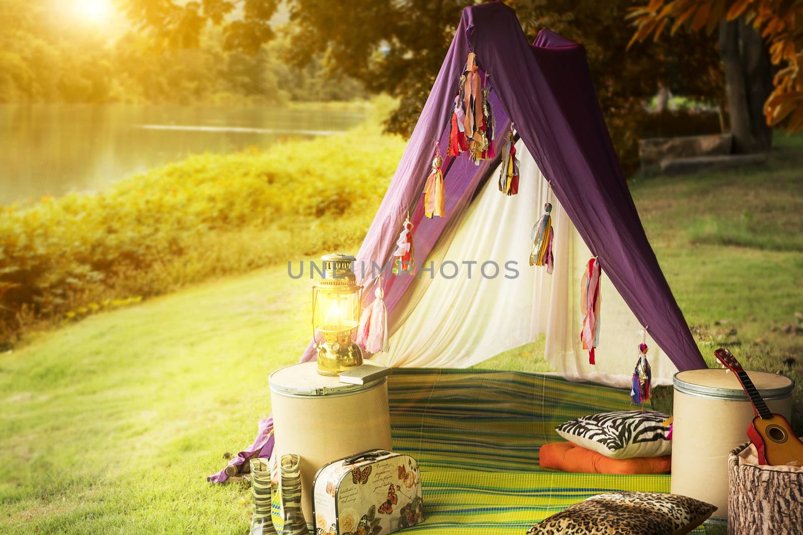 Camp in the mountains near of the lake in autumn season.