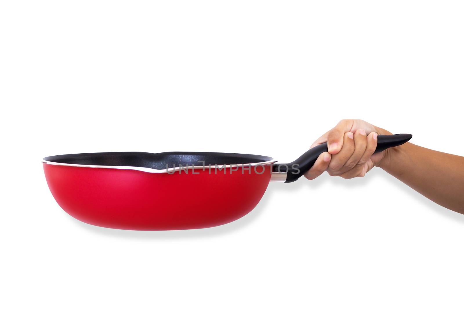 Hand holding red frying pan isolated on white background