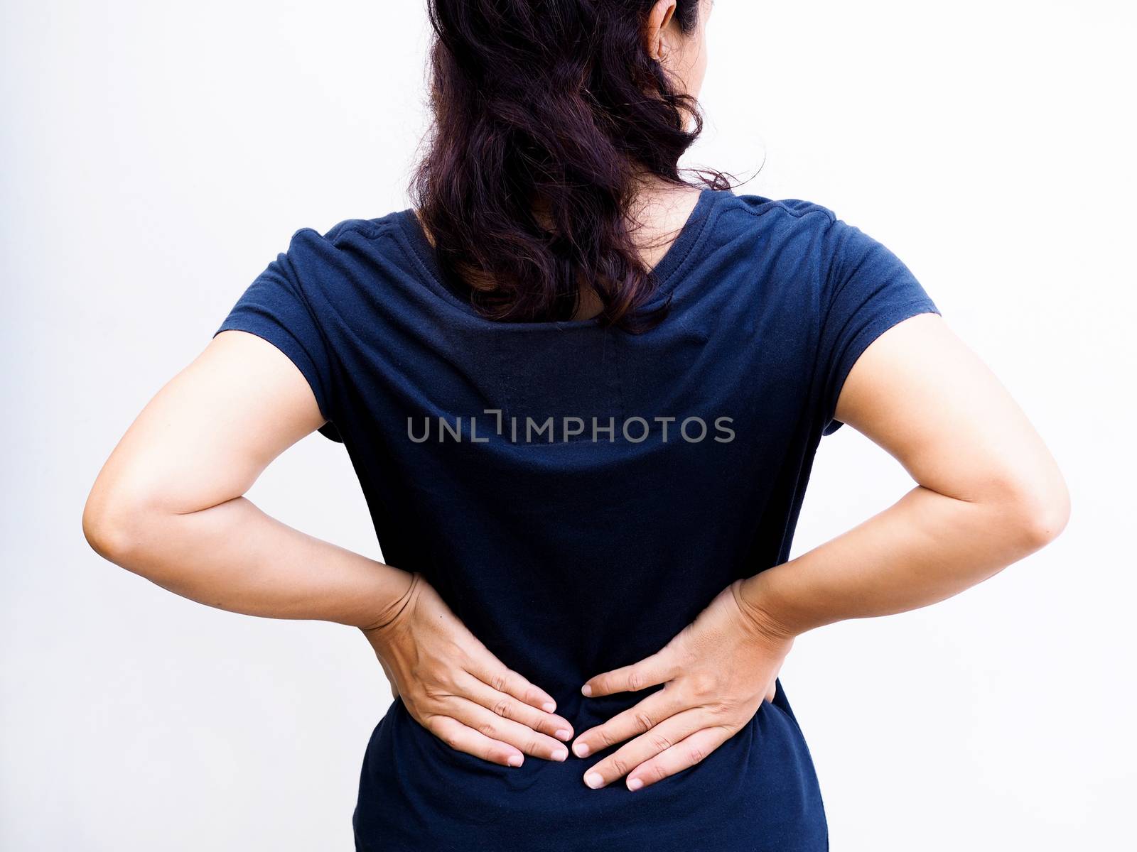 Young thai asian woman suffering low back pain and waist lumbar by kittima05