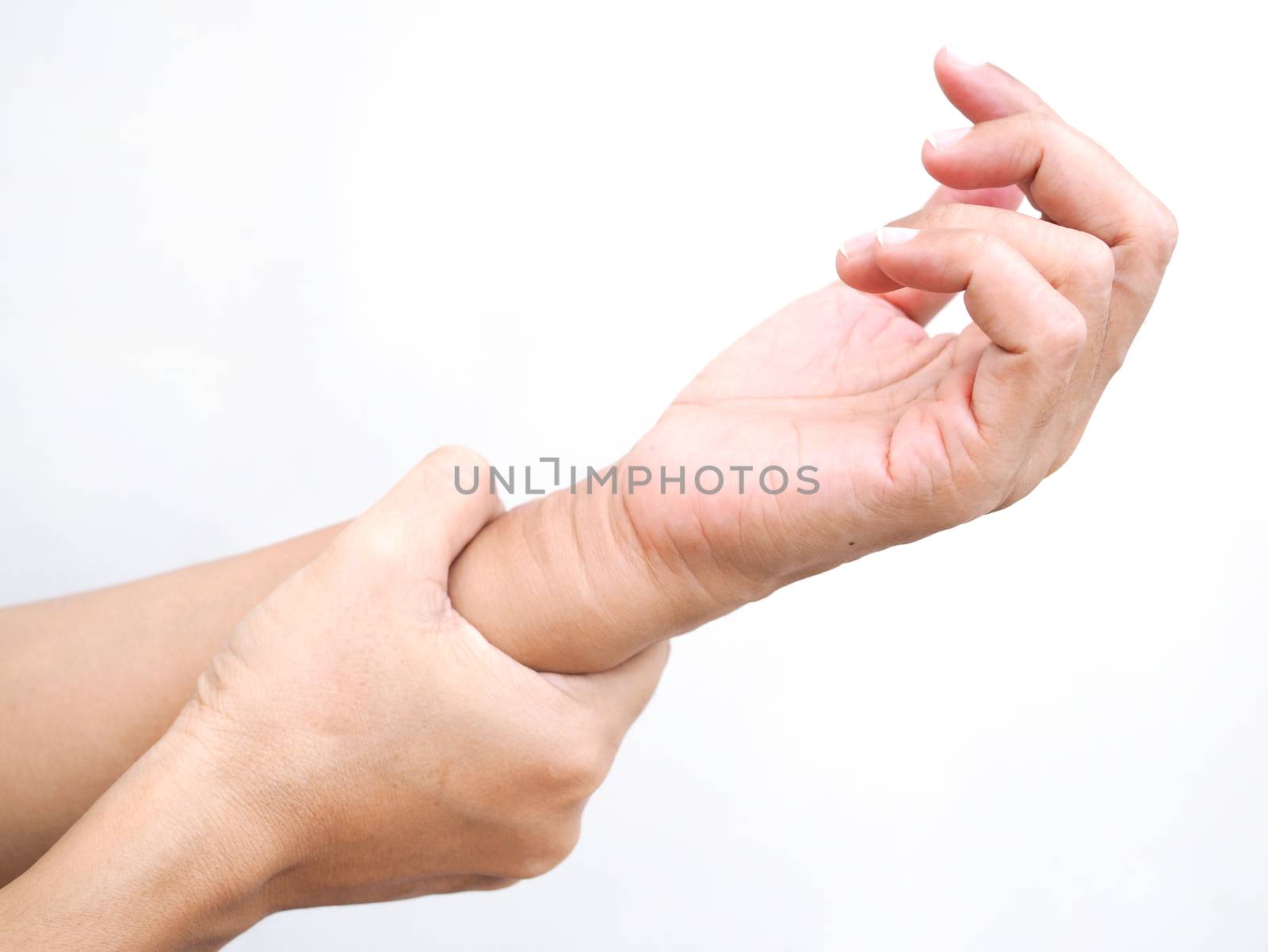 Close-up of hand massage on body with wrist pain and arm aches. by kittima05