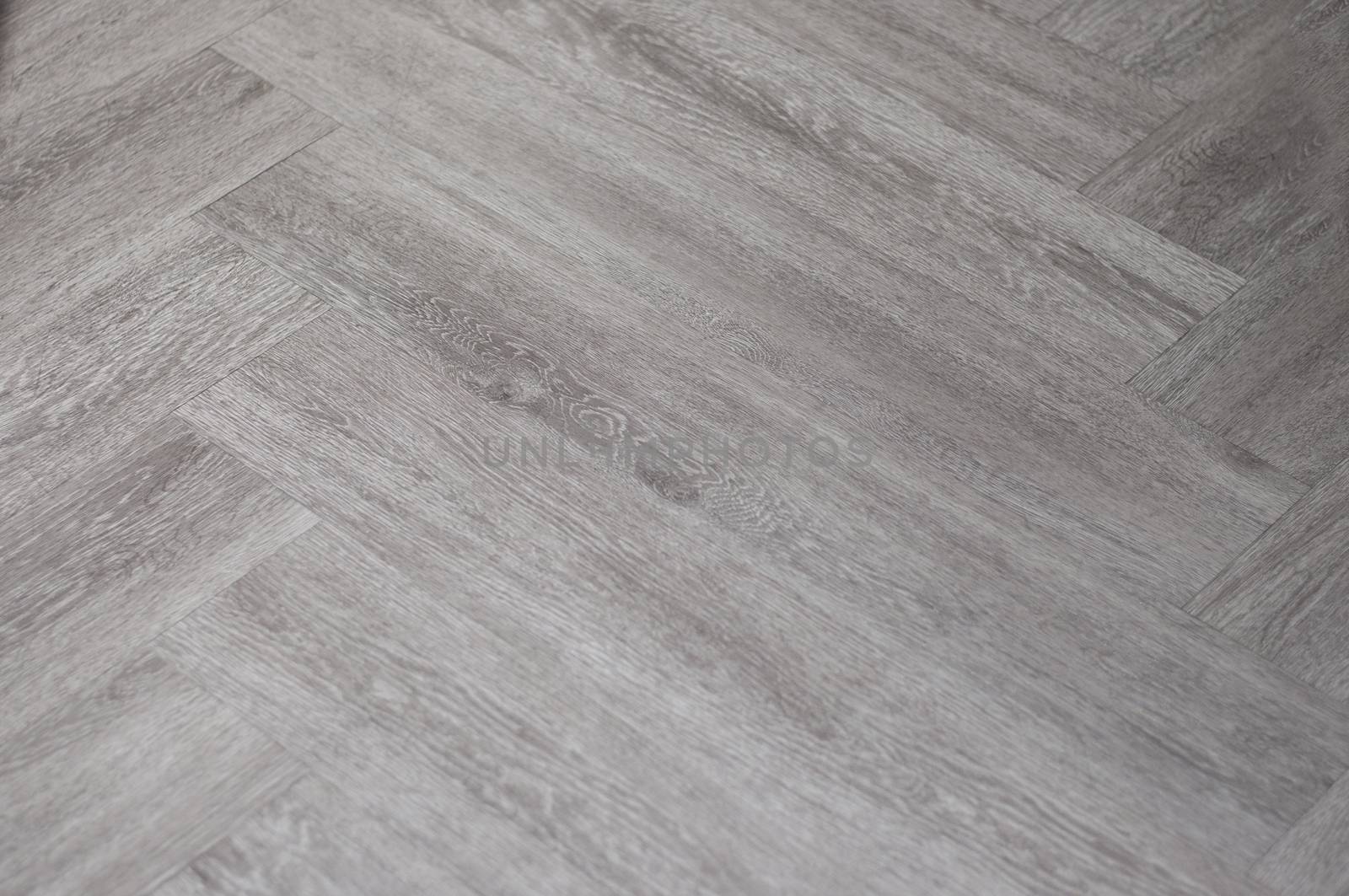 Wood pattern installing floor tile.  by Kingsman911