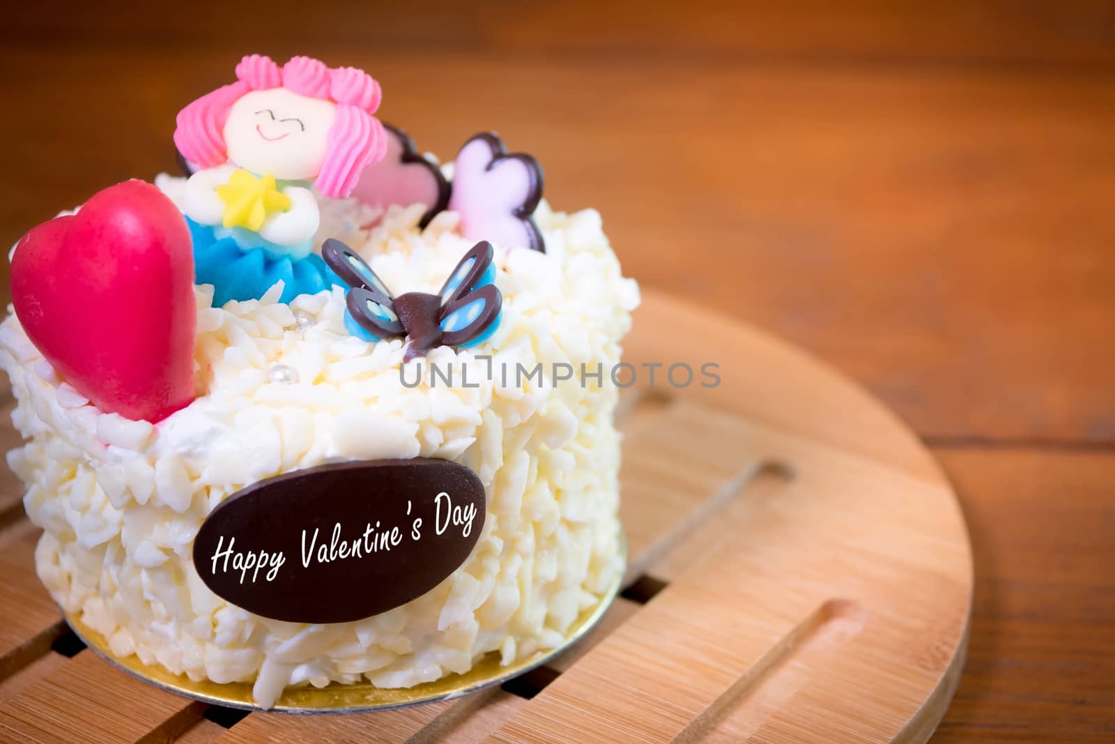 Love concept : Valentines cake with heart and cute decorate . Valentines background