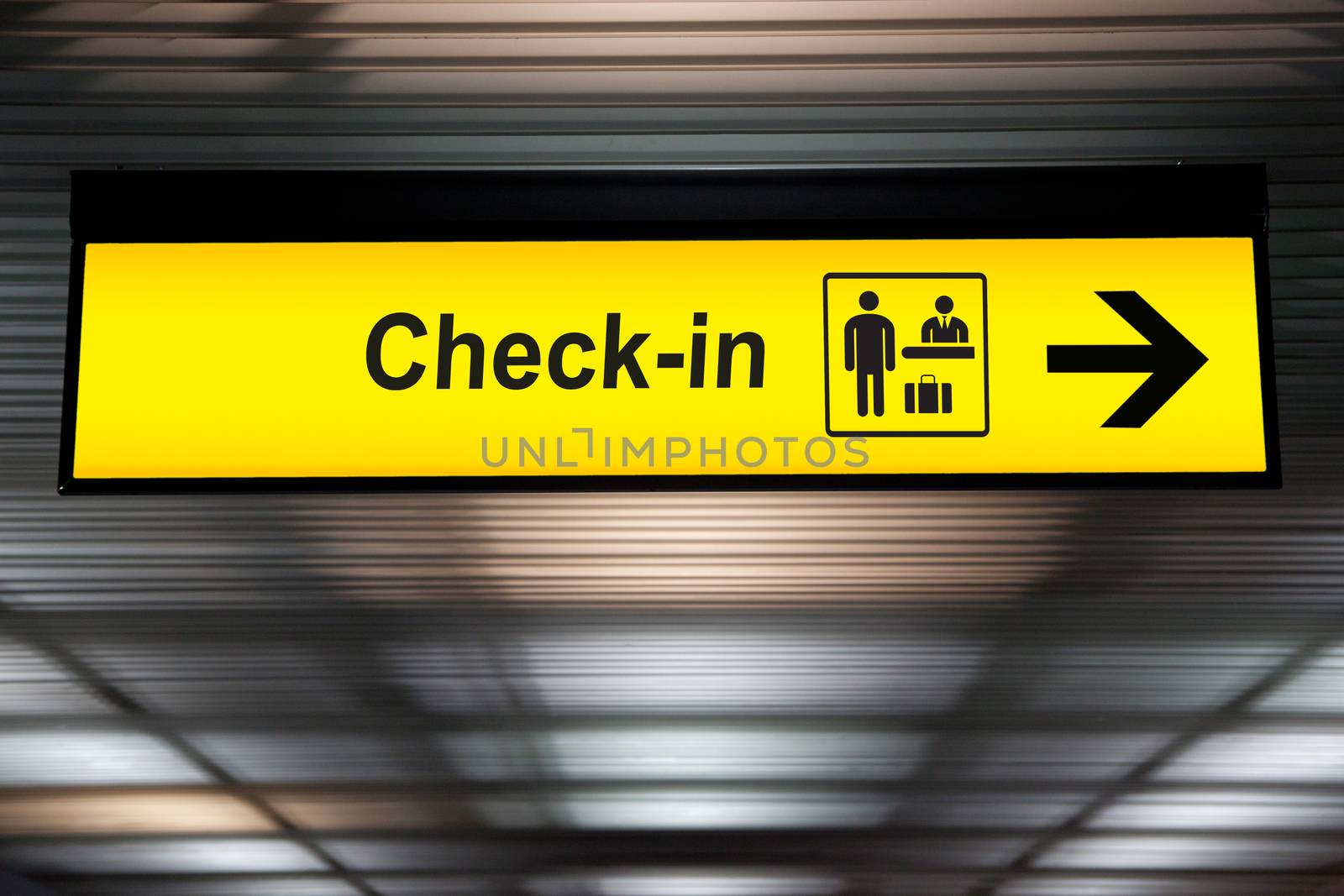 check in information sign at the airport. by asiandelight