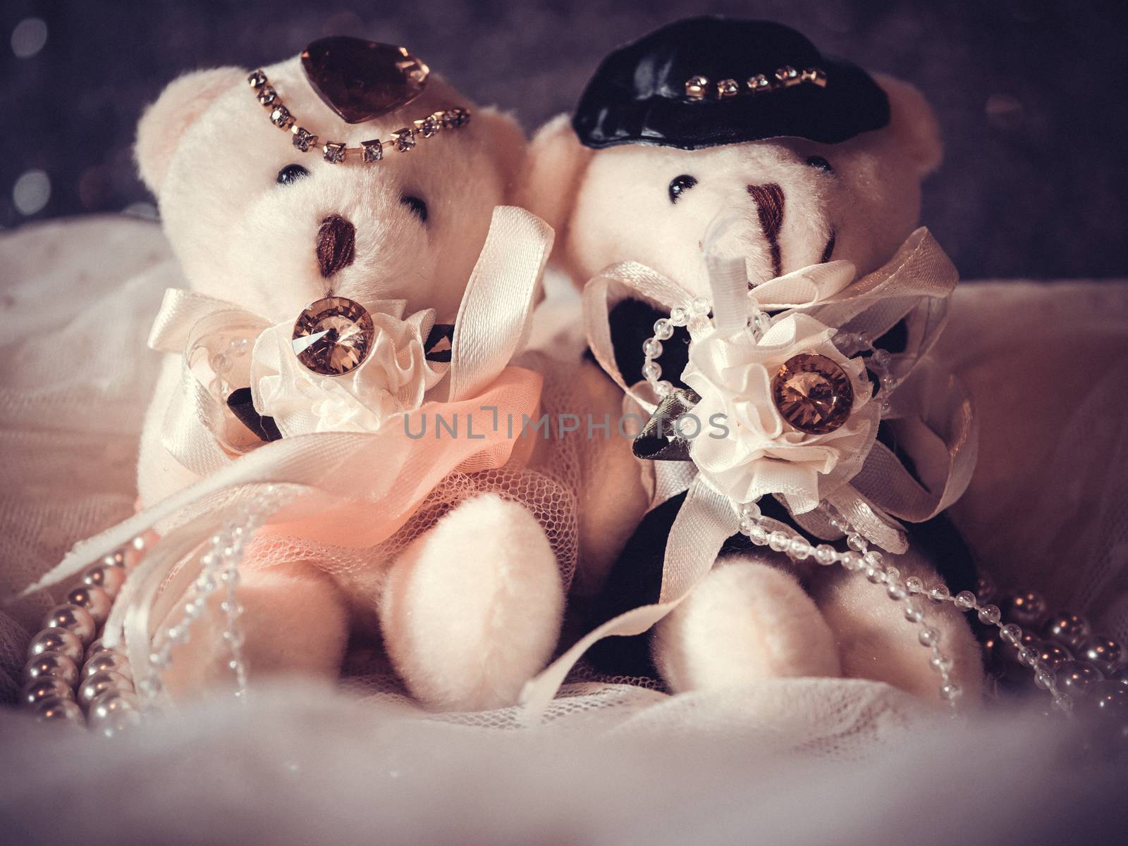 love concept : couple teddy bears in wedding dress for valentine greeting card with bokeh background. love concept wallpaper. wedding invitation card