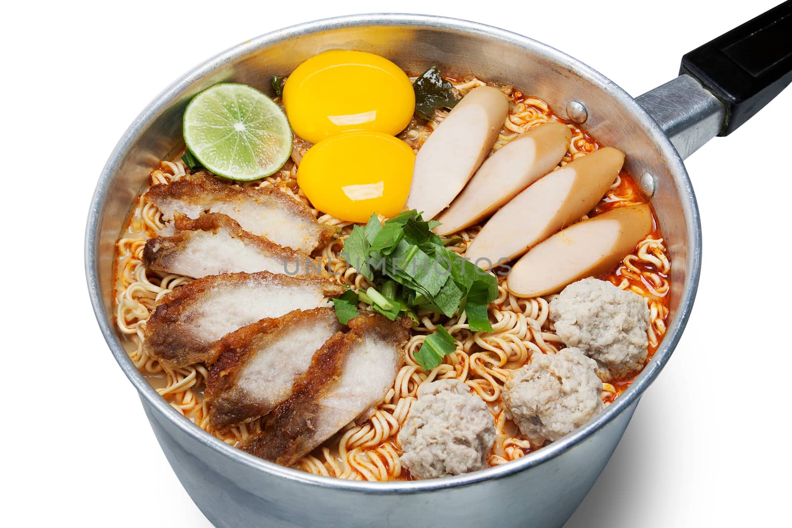 Bowl of spicy instant noodles isolated on white background. Topping with eggs, lemon, pork , crispy pork, sausage and coriander