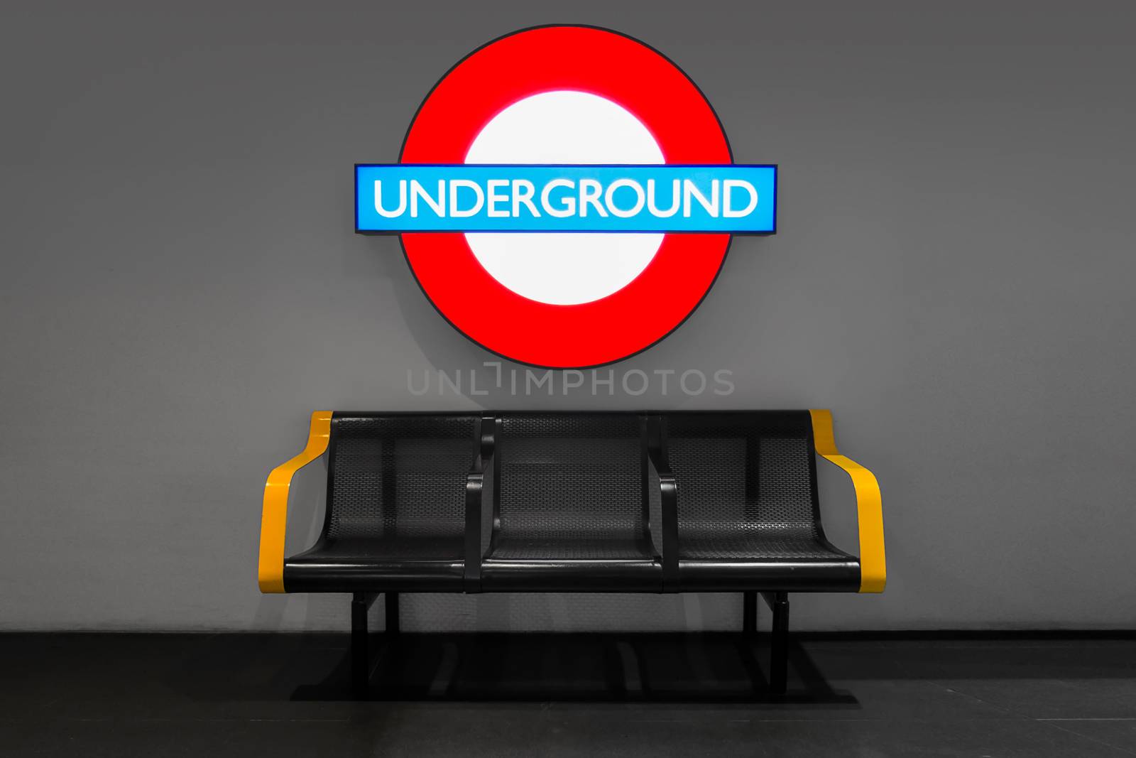 underground sign with bench color filter effect. mockup of underground led light box sign for background