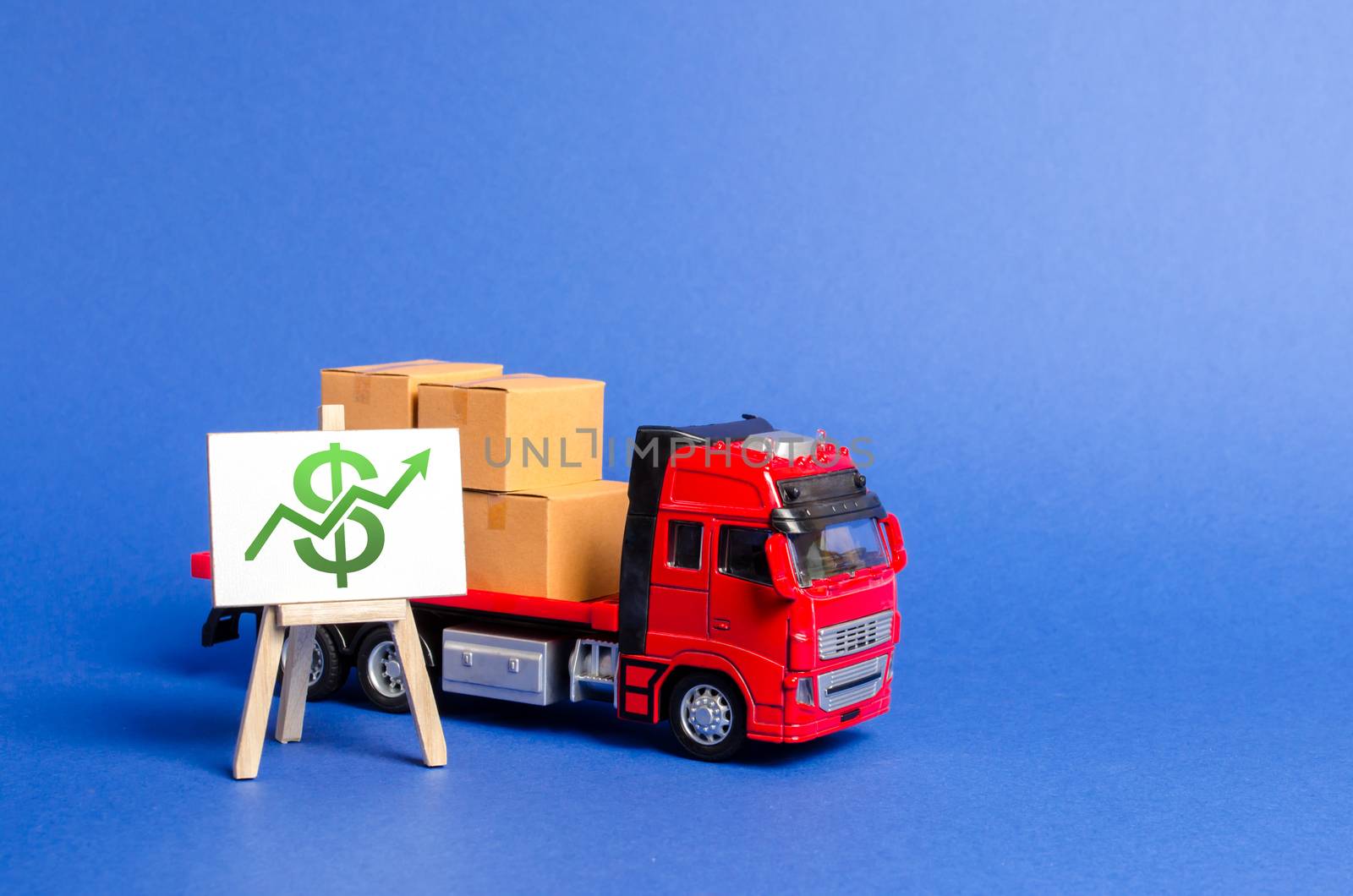 Red truck loaded with boxes and stand with a green dollar up arrow. Raise economic indicators and sales. Exports imports. High trade volumes, growth production, storage infrastructure Transit delivery by iLixe48