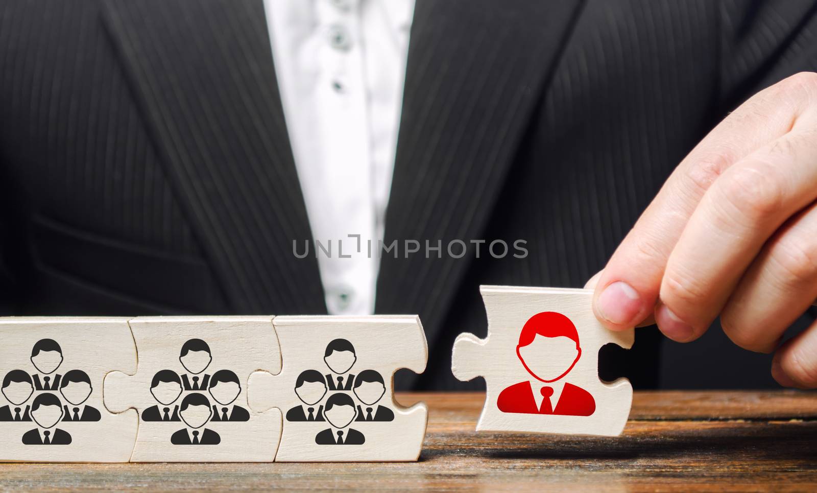 A businessman appoints a leader to the head of the team. Creation of an effective teams of specialists for the implementation of a new project. HR recruiting. Management appointment. nepotism by iLixe48