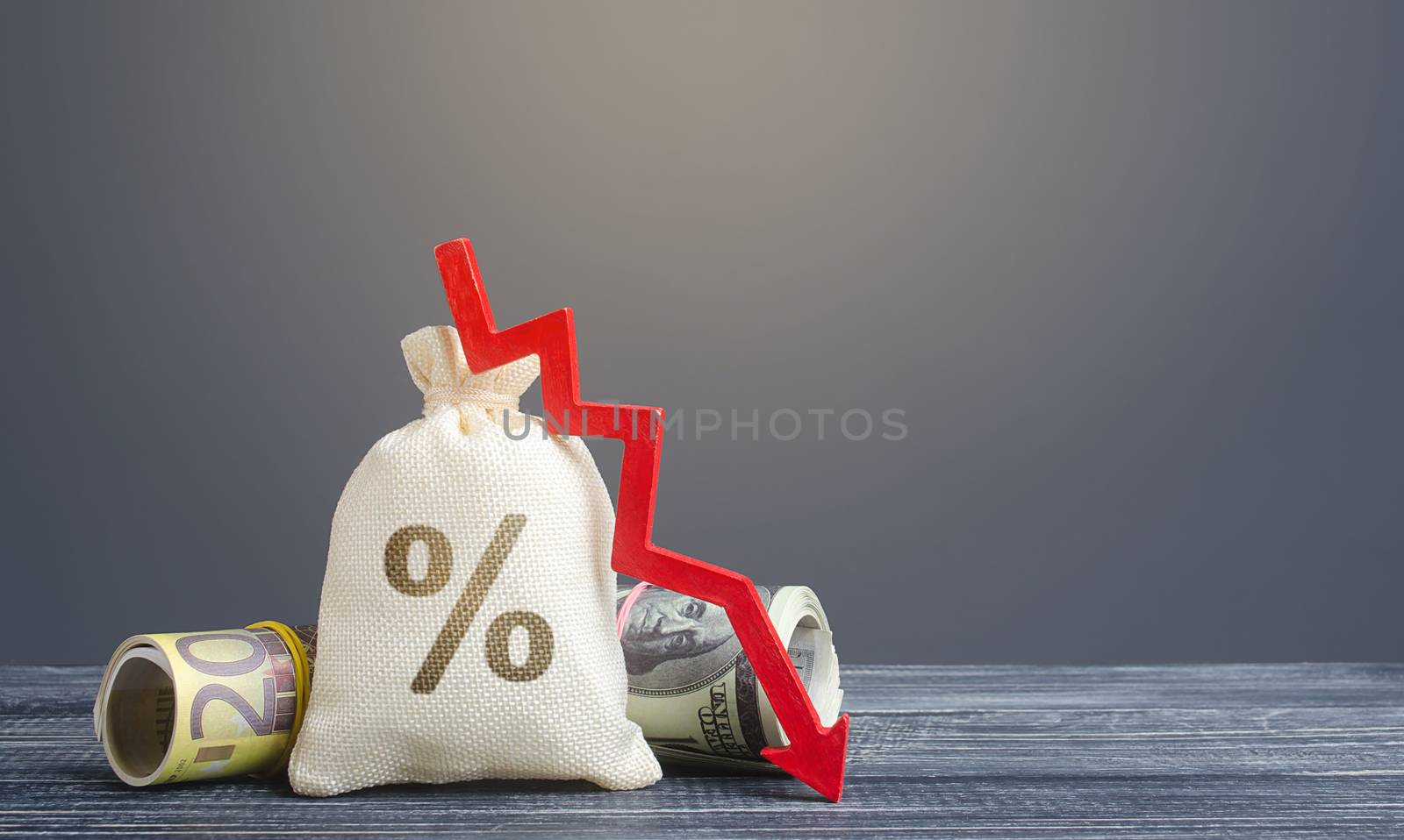 Money bag interest rate and red arrow down. Favorable offers on deposits. Cheap loans for economic business growth. Central bank discount rate. Diversification, decrease in foreign currency borrowing. by iLixe48