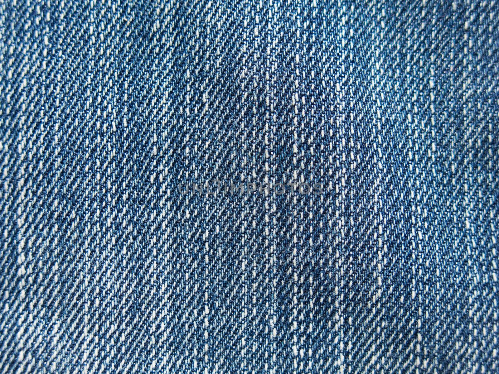 Perspective and closeup view to abstract space of empty light blue natural clean denim texture for the traditional business background in cold bright colors with diagonal shift tilt lines and stitches by asiandelight