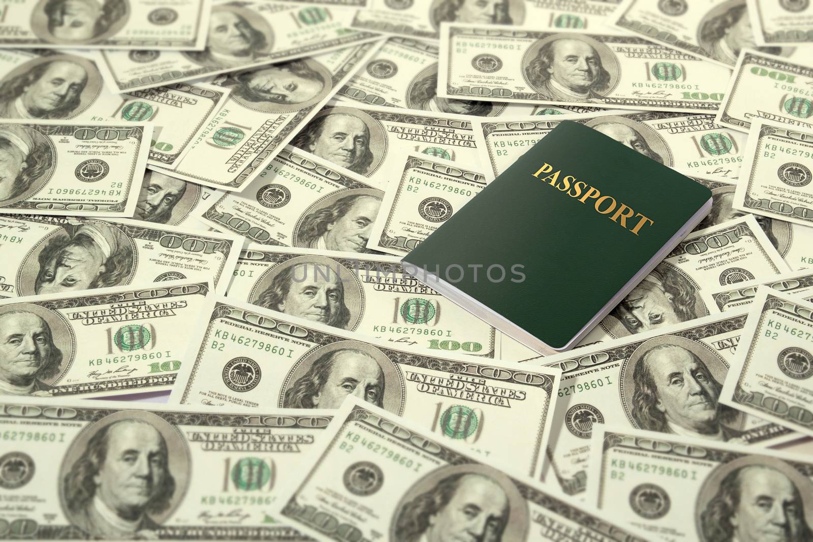 travel and currency concept. passport on dollars banknote pile as background.