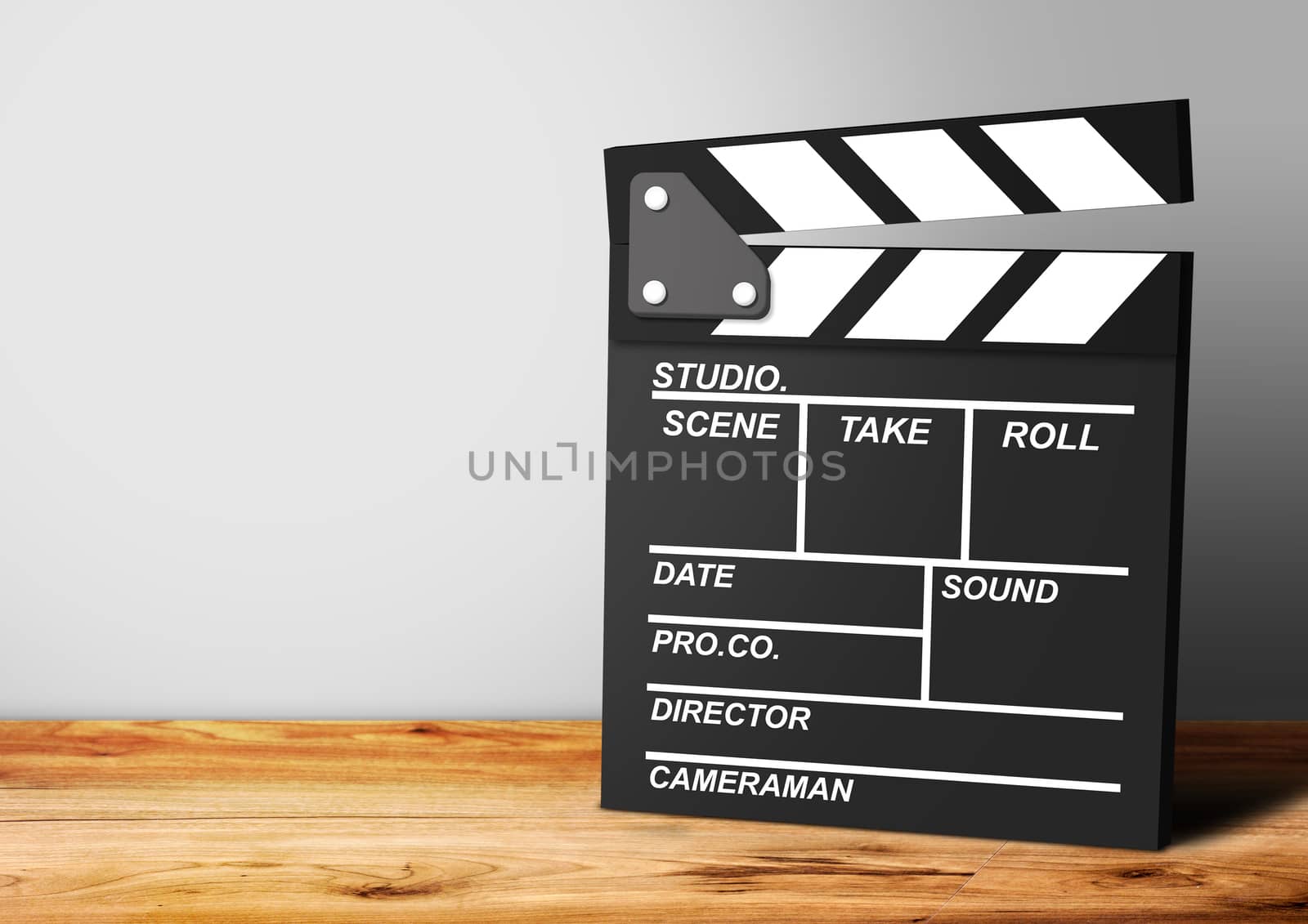 Movie clapper on a wooden background, cinema concept