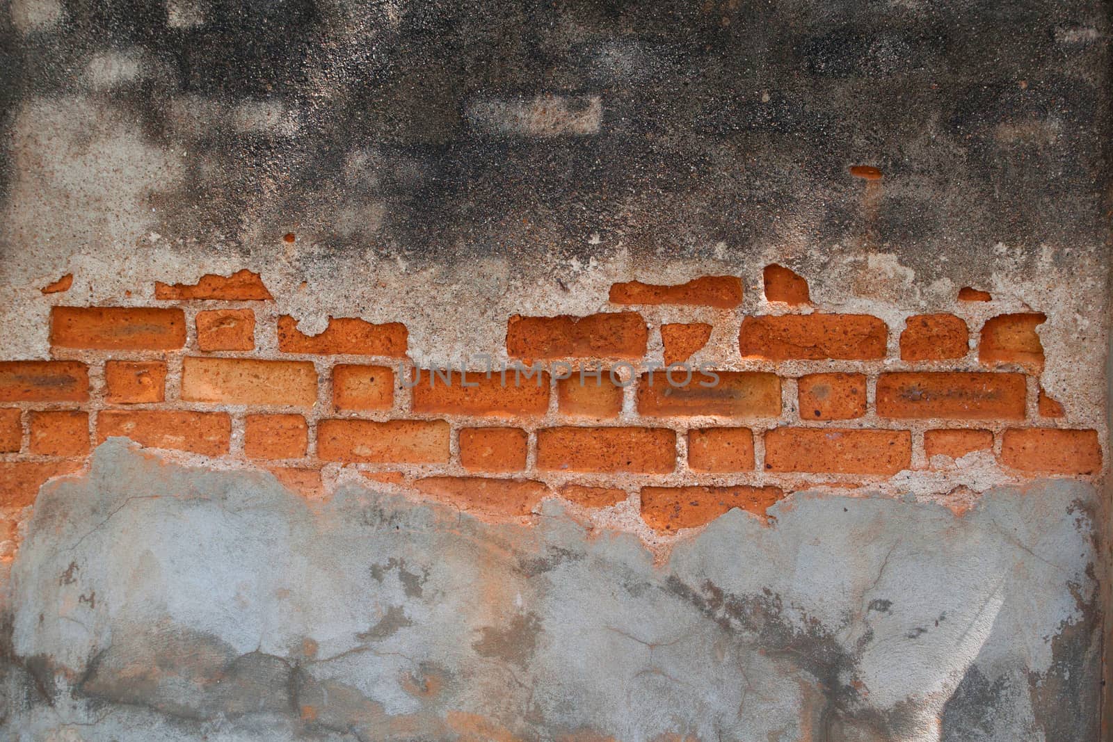 dirty cement crack on vintage old red brick wall. antique brick background wallpaper