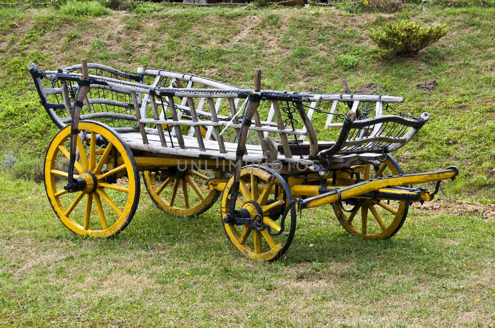 old wooden carts, placed on the lawn