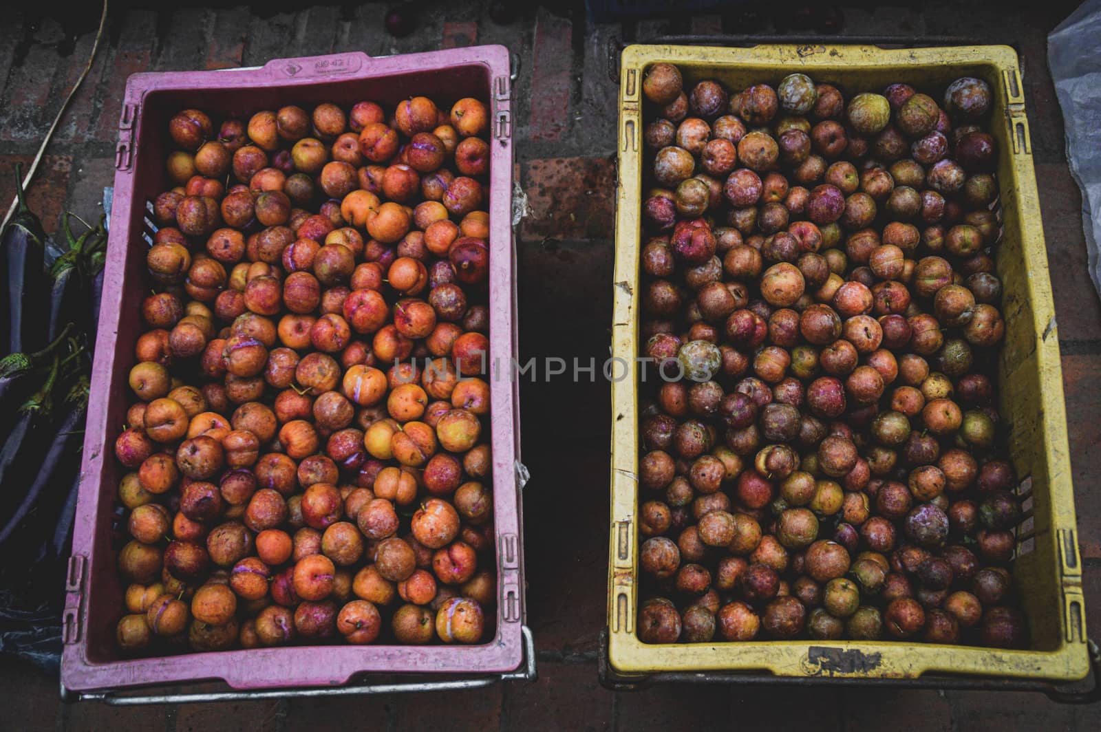 Crab apples (Malus doumeri) sold in Luang Prabang Morning Market in Laos that shows the life, culture and livelihood of the local people
