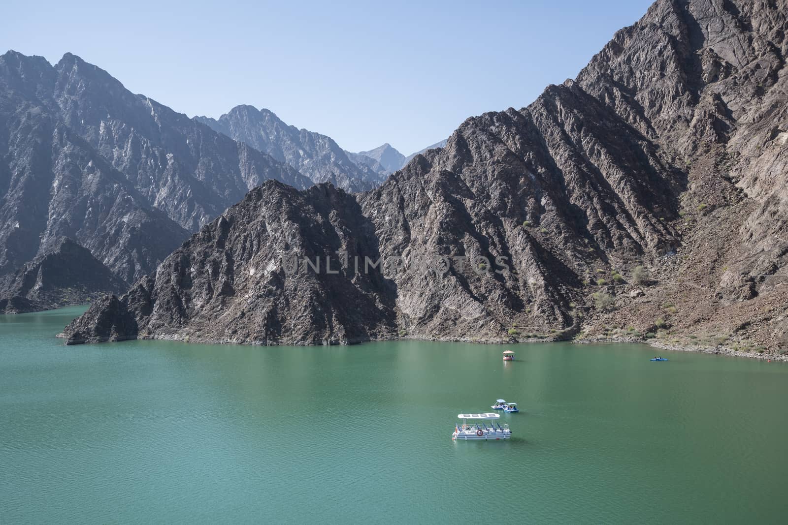 Hatta is the inland exclave of the emirate of Dubai in the UAE where people can enjoy kayaking and boating on the lake of Hatta Dam. United Arab Emirates