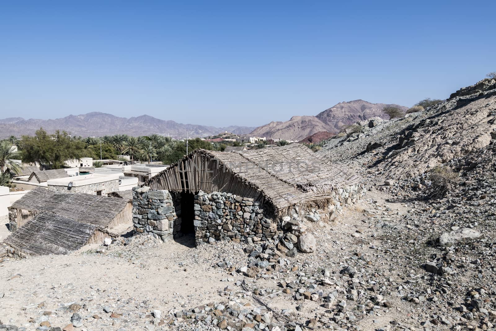 Houses in stones at Hatta Heritage Village, preserved, reconstructed and opened in 2001 by the government to showcase rural living dating back centuries. Dubai Emirates, United Arab Emirates