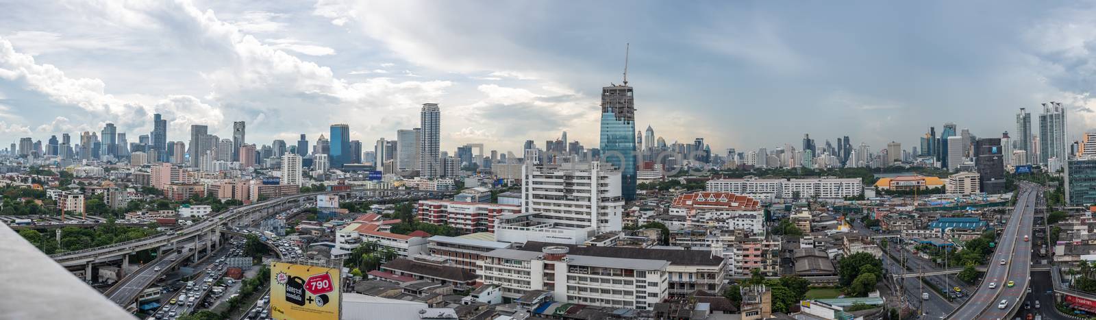Bangkok, Thailand - May 26, 2018 : Panorama cityscape and building of city in storm clouds sky from skyscraper of Bangkok. Bangkok is the capital and the most populous city of Thailand.