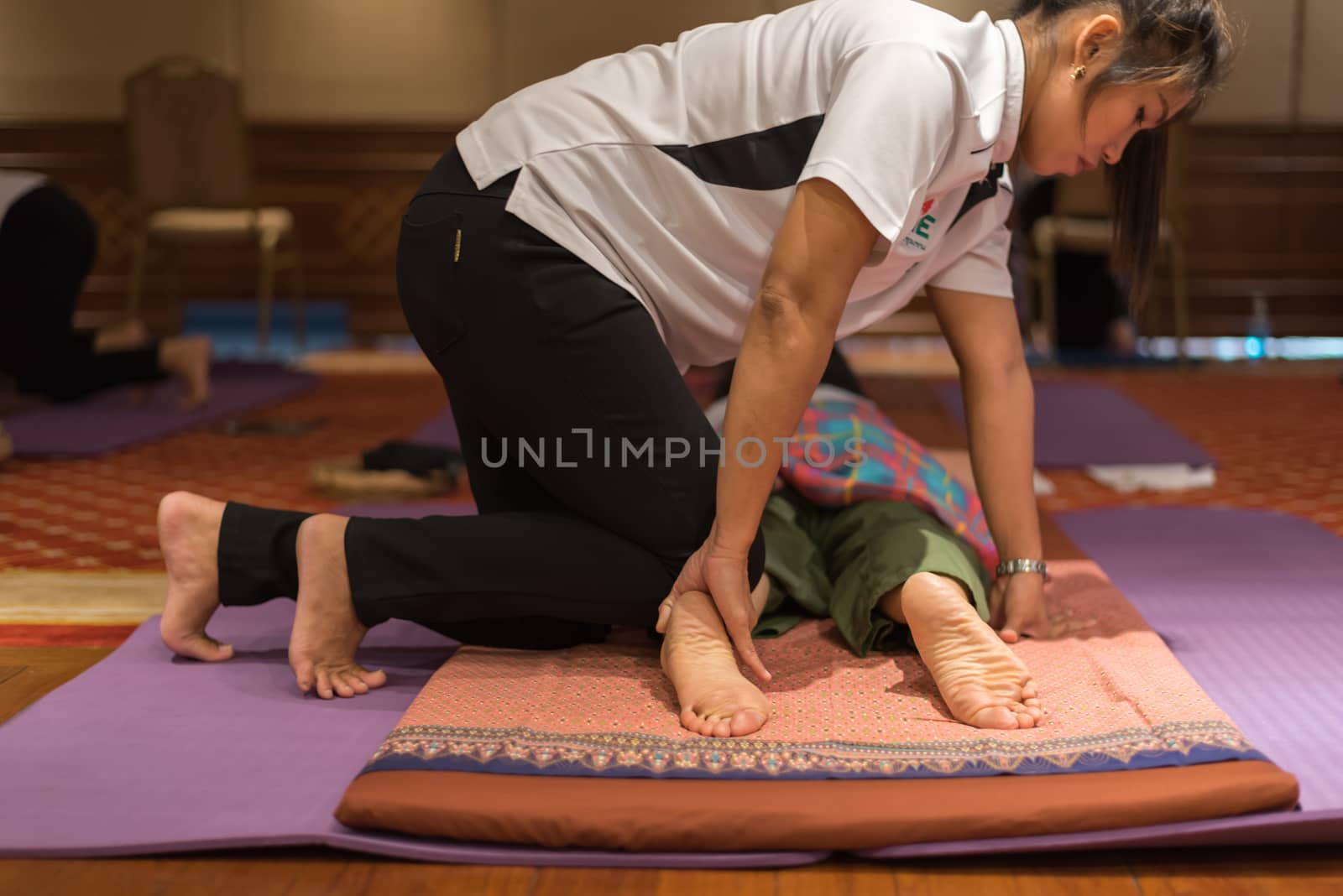 Bangkok, Thailand - June 18, 2018 : Unidentified Thai woman to take of service Thai traditional massage for treat aches and pains.